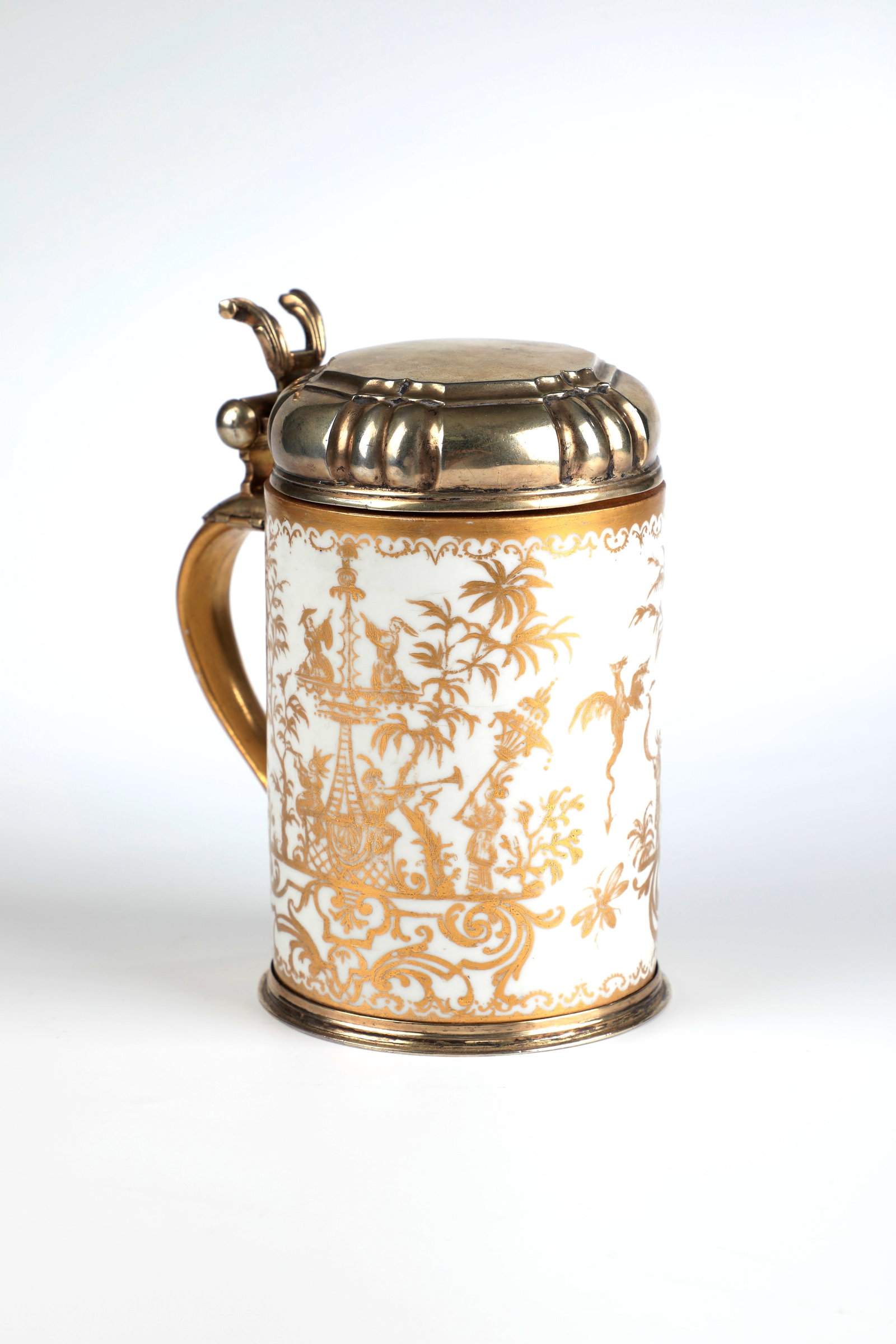 An Important House Painter's Porcelain Jug with Vermeil Mount: Important house painter's porcelain jug with Meissen vermeil mount, c. 1725, décor Bartholomäus Seuter, Augsburg, c. 1725-1730 Decoration executed on the cylindrical, glazed wall in partly etched