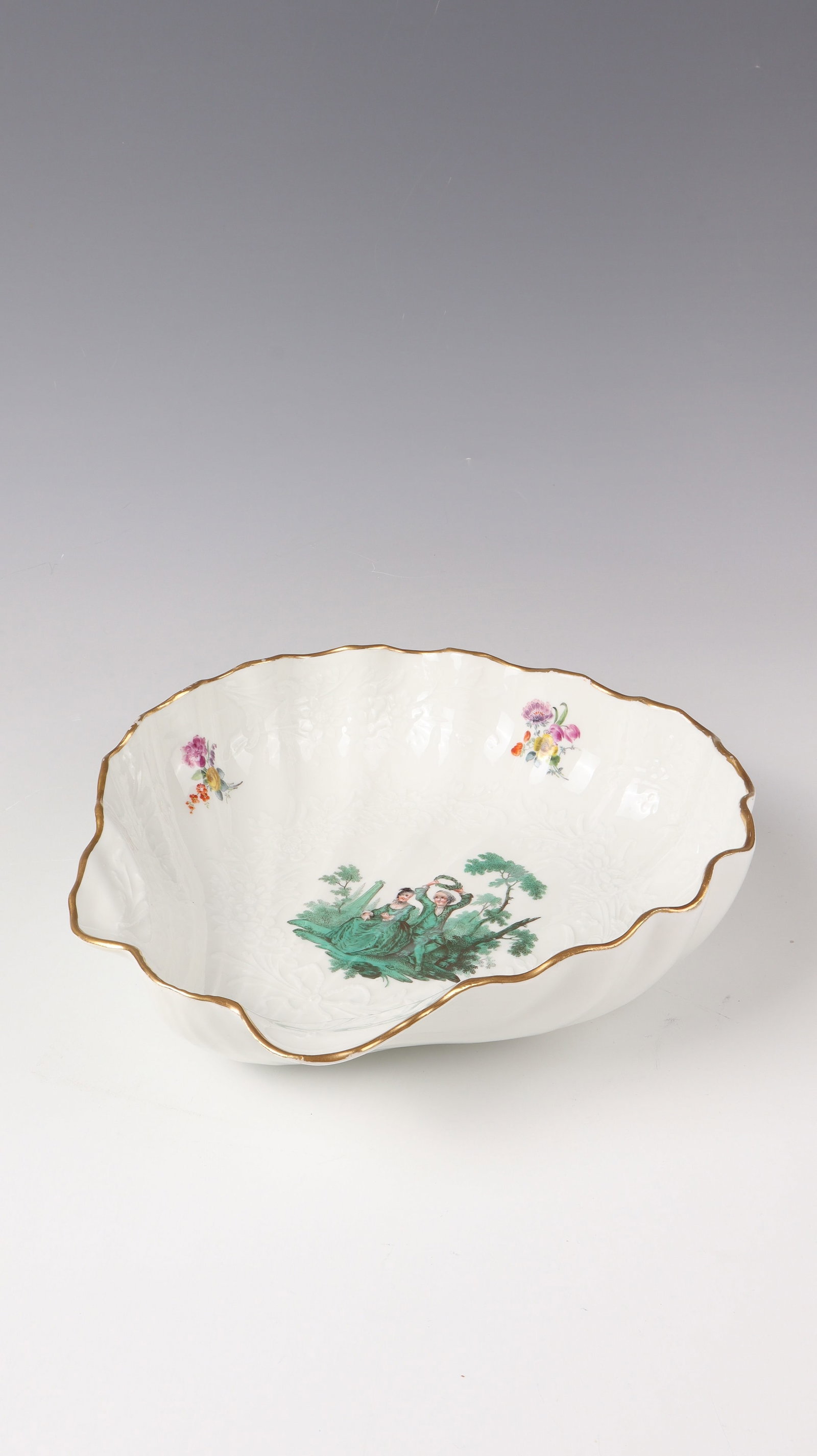 State Bowl: Meissen ceremonial bowl, c. 1760, porcelain, glazed. From the green Watteau service for the Saxon court. With area-filling Gotzkowsky flower relief and figure painting in shades of green in the mirror
