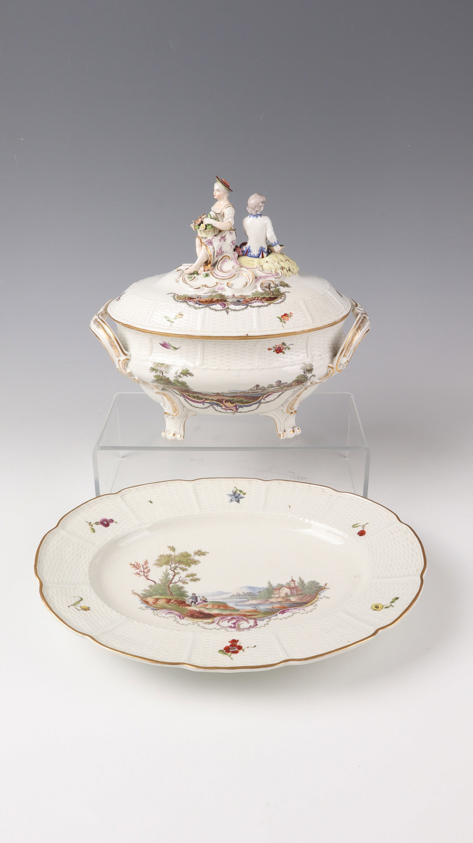 Rococo terrine with présentoir: Rococo terrine with Présentoir, Ludwigsburg, c. 1765-70, porcelain with polychrome painting and gold staffage. On four volute feet terrine with landscape scenes: very finely painted river landscapes