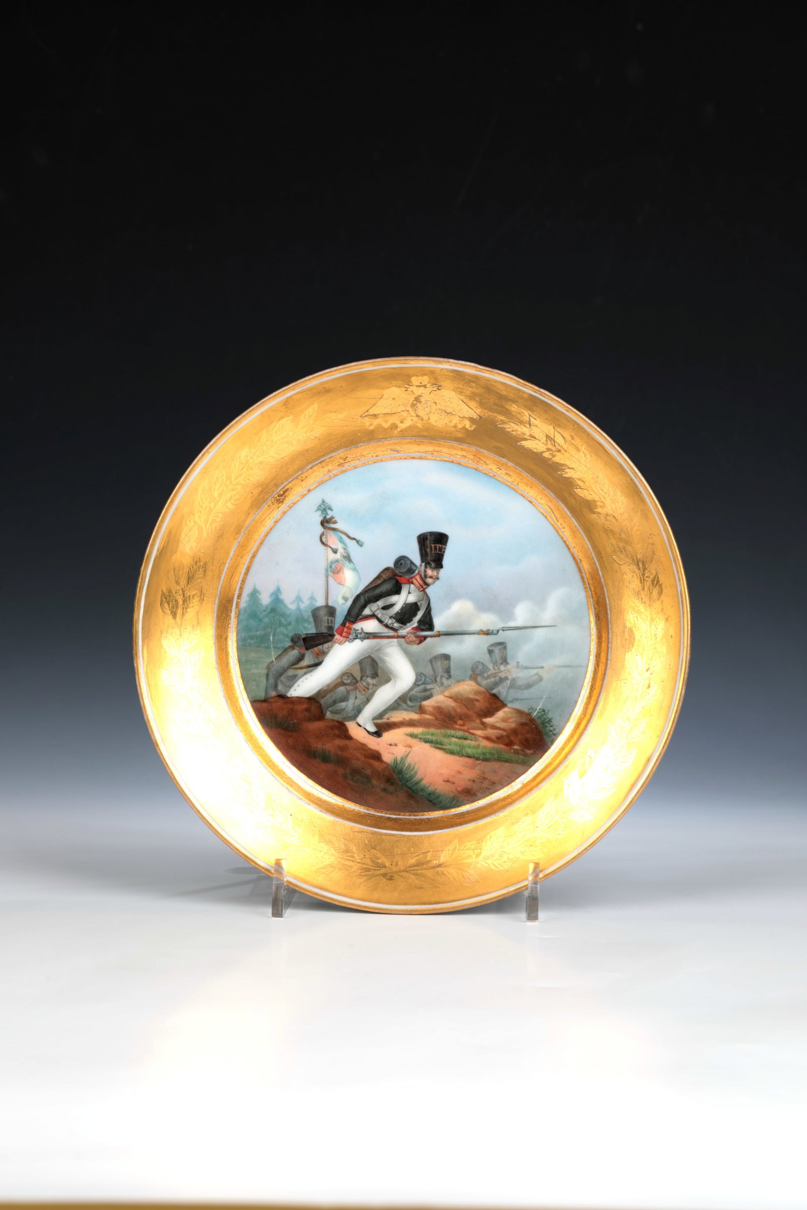 Plates from the military service: Plate from the Military Service St. Petersburg, Imperial Porcelain Manufactory, Nicholas I Period (1825-1855) Porcelain. In the mirror in the finest depiction of an attacking soldier executed in