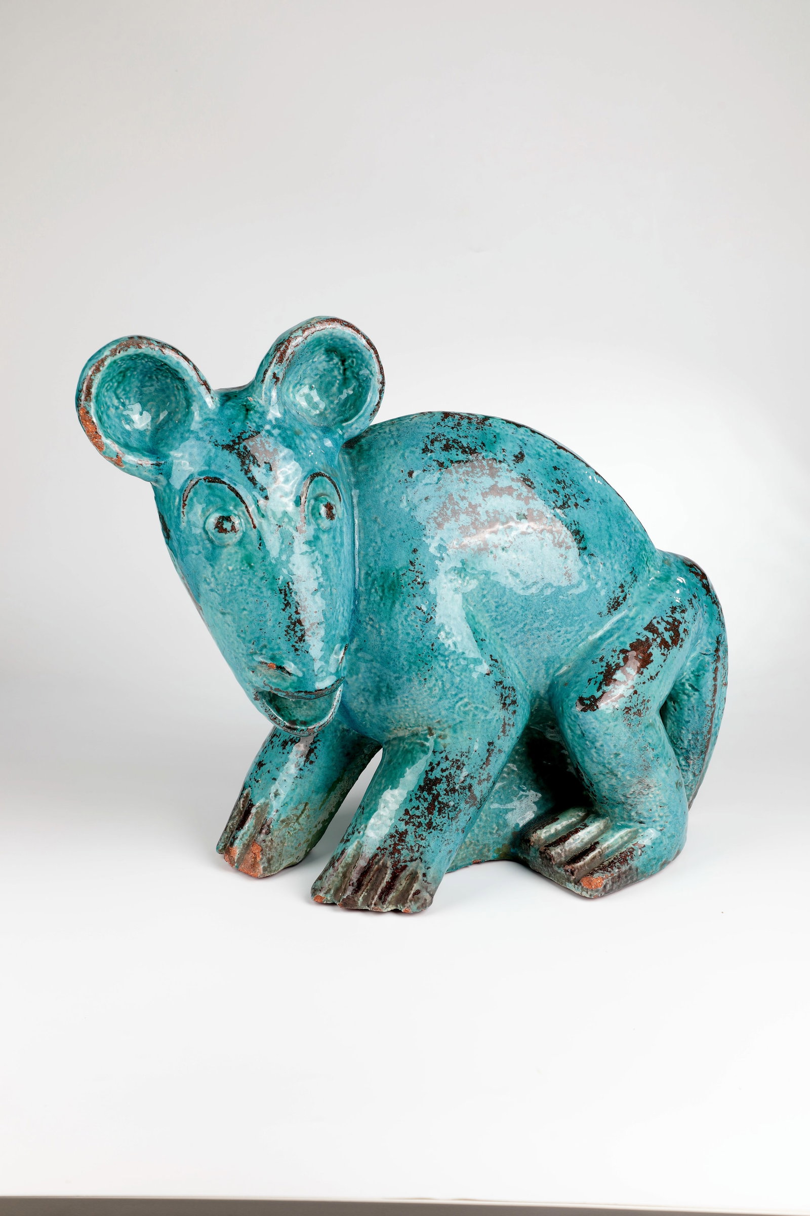 Large Tree Monkey: Large Tree Monkey Karlsruhe Majolica Manufactory, designed by Ludwig König, around 1930 Brick-coloured majolica with glaze in brown and turquoise. Seated, attentively looking monkey in the manner of 