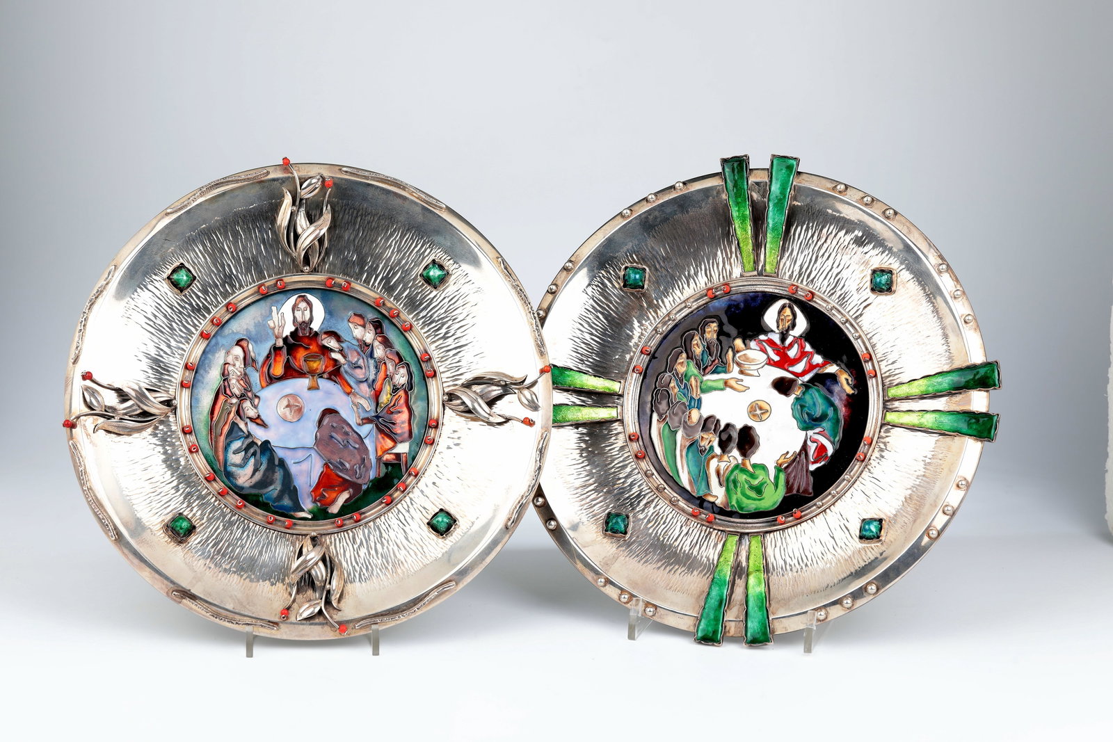 Two museum silver plates with the Lord's Supper: Two museum silver plates with the Last Supper Probably Spain, Barcelona, around 1930 Light domed mirror with various depictions of the Last Supper, executed in polychrome enamel melting technique, as 