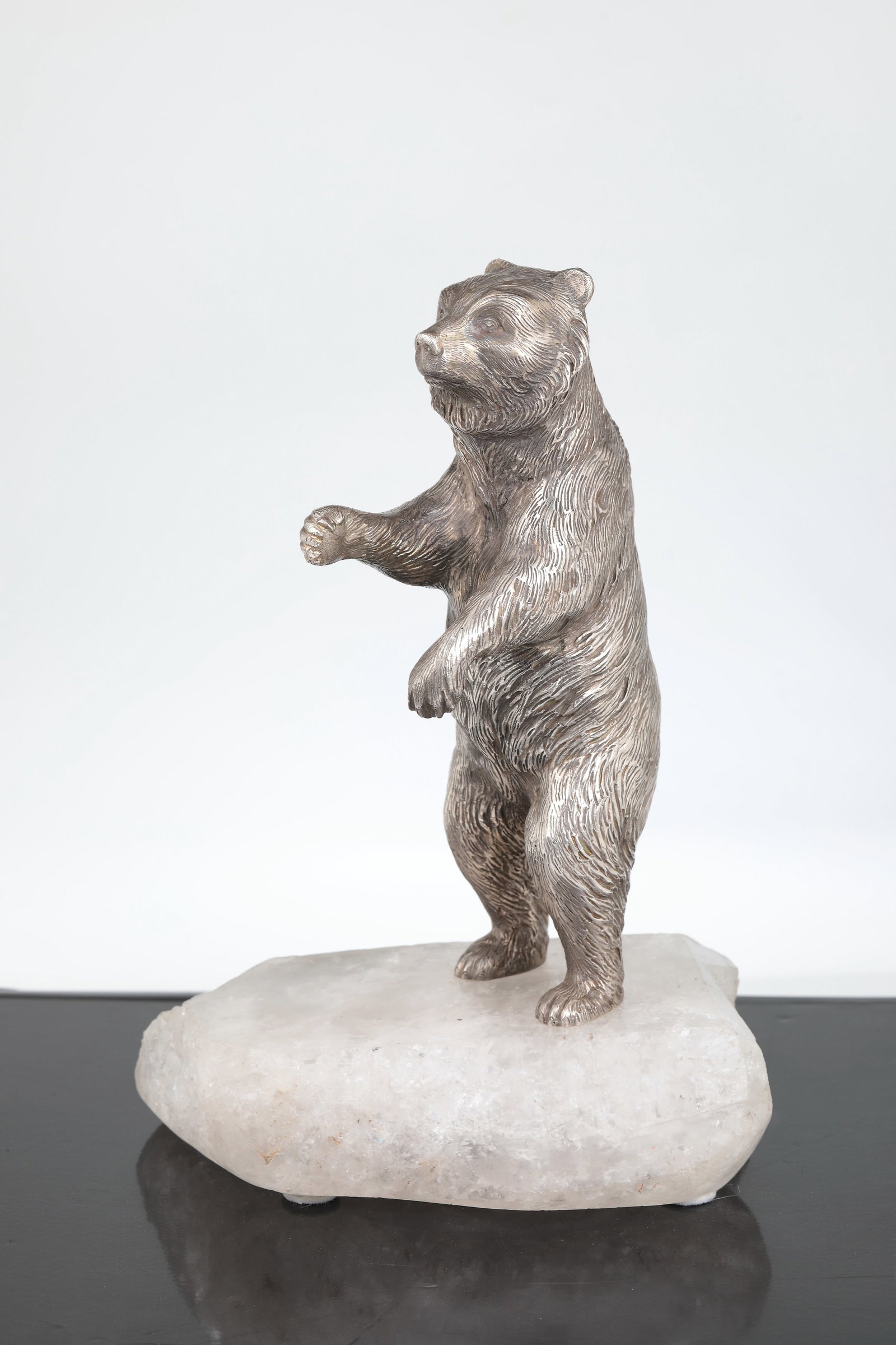 Standing Silver Brown Bear on Rock Crystal Base: Standing brown bear made of silver on rock crystal base Russia, after 1880 Naturalistically worked, standing bear made of silver, on the left inner foot marks: double eagle of the Tsarist Empire, indi