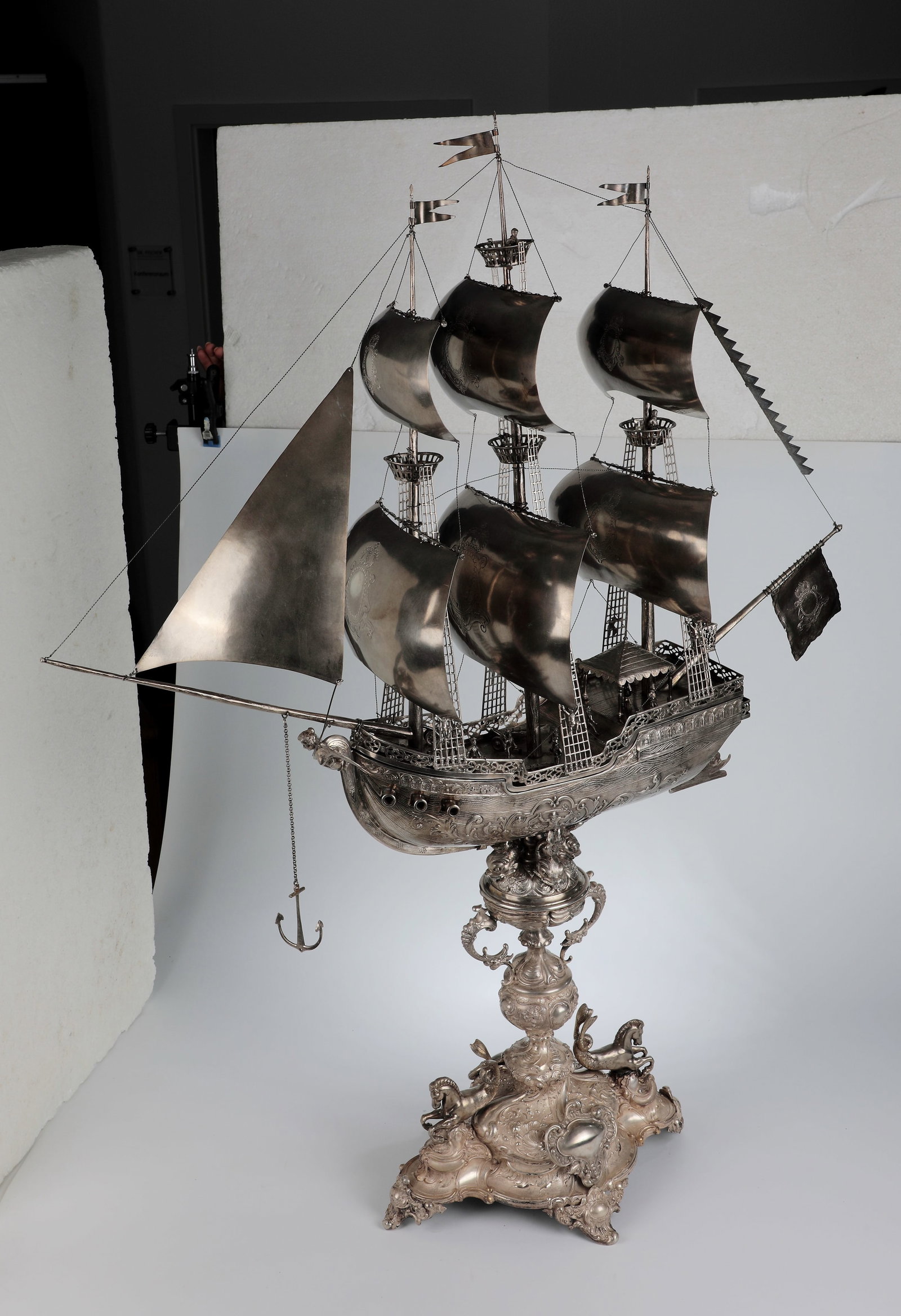 Magnificent table decoration made of silver: Magnificent table decoration made of silver Germany, after 1880 Elaborate work made of embossed, cast, stamped and engraved silver. A passable base resting on four volute feet with shellwork and rocai