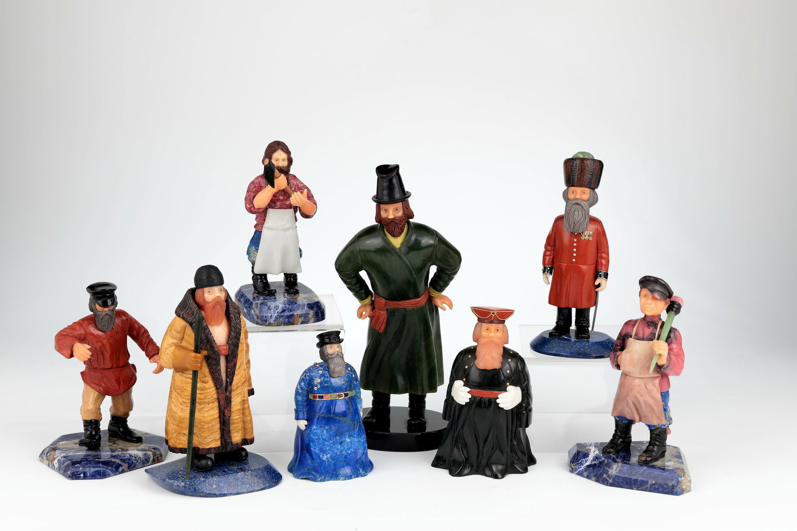 8 Faberge Figurines: Collection of eight rare gemstone figurines Russian, 1st half of the 20th century Collection of eight rare gemstone figurines in the style of Fabergé. Crafted from various gemstones, including jasper