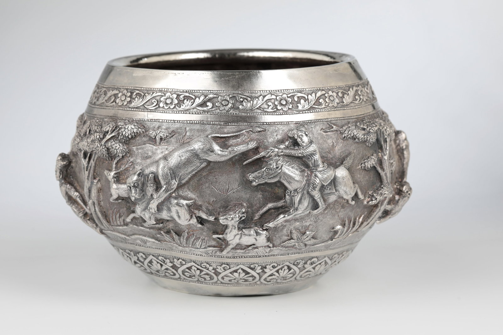 Bowl ''Thabeik'': Bowl ''Thabeik'' Burma (today Myanmar), c. 1900 round, bulbous bowl made of silver. Richly decorated in high relief all around: below the mouth and in the lower wall area floral and ornamental