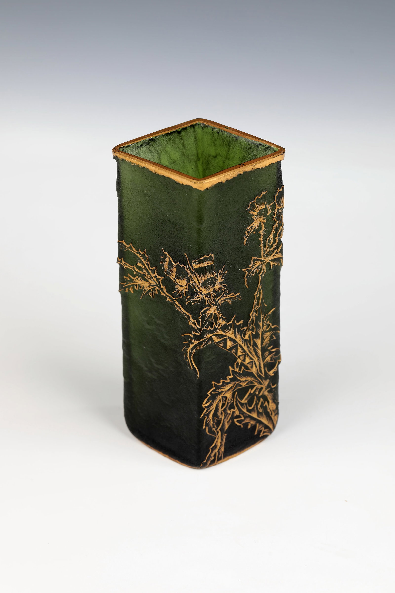 Vase ''Chardon'': Vase ''Chardon'' Daum Frères, Nancy, 1893 Green glass, mould-blown. Etched, sanded, cut. Vessel body with longitudinal rectangular cross-section. Relief decoration on the roughly etched wall: flo