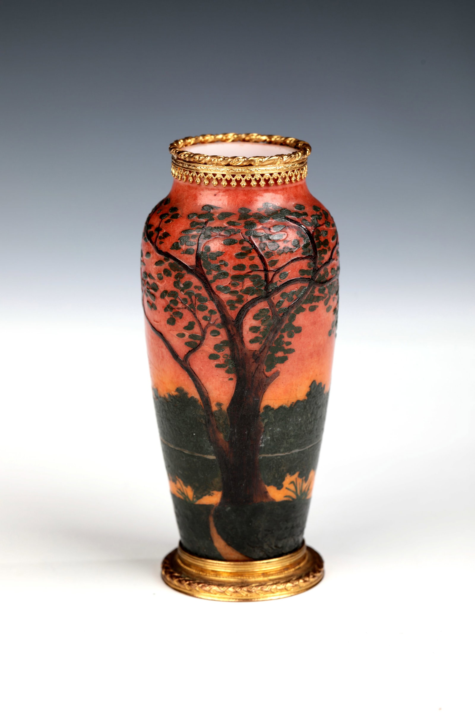 Vase ''Paysage fluvial'': Vase ''Paysage fluvial'' A. Gauthier, Paris, circa 1920 Opaque white glass (frosted glass). Decor etched all around and painted in colourful enamel: river landscape with trees. Inscribed on the wall