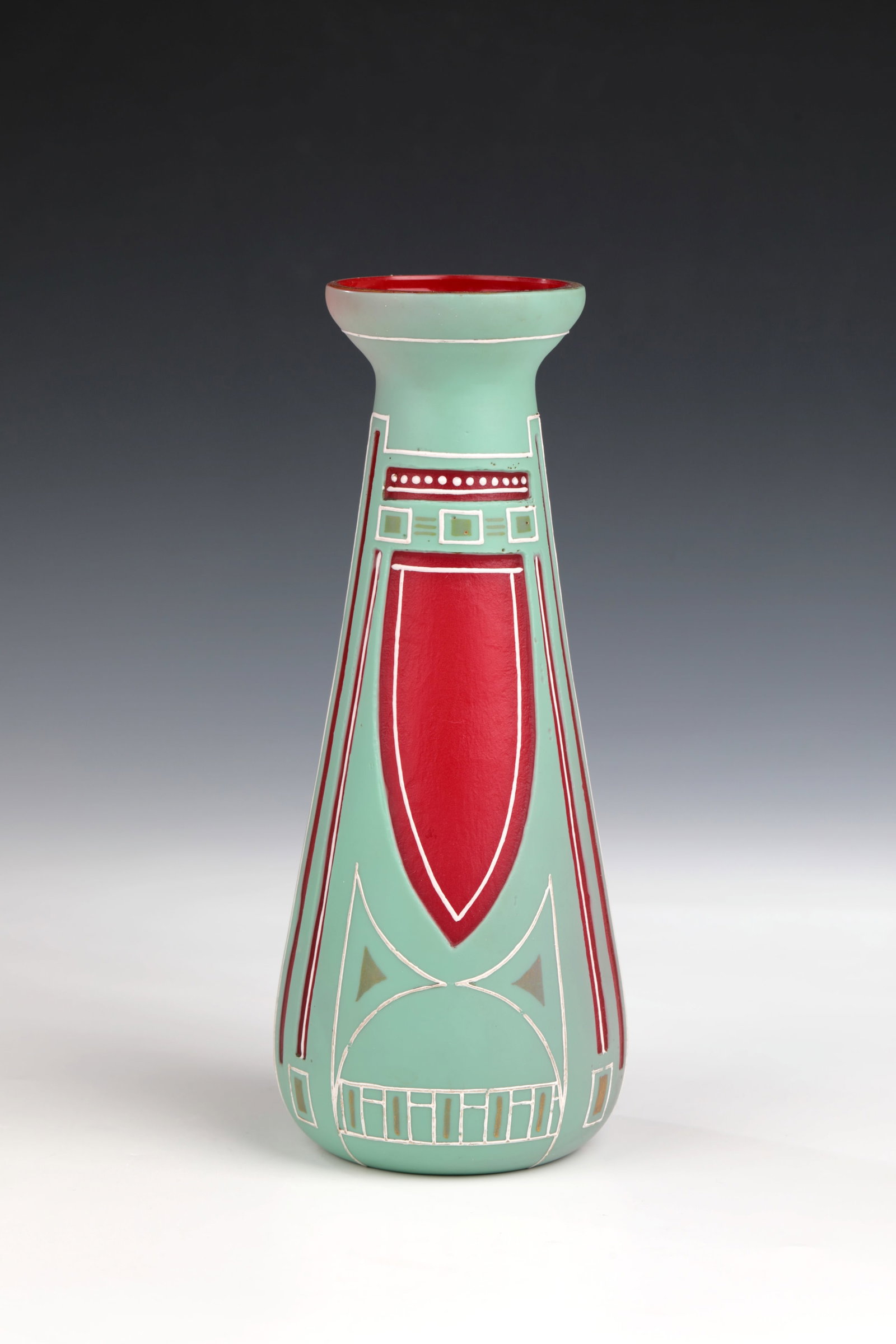 Vase: Vase Josef Riedel, Polaun, c. 1900 Colorless, opaque red underlaid glass with gray-green overlay. Ornamental decoration etched all around, painted with gold and white relief enamel lines. Gold-plated