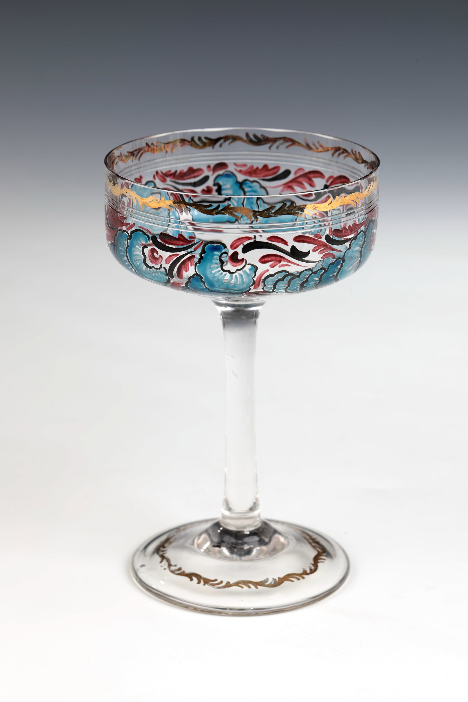 Champagne bowl: Champagne bowl Emmy Seyfried, Munich, c. 1920 Colourless glass. Bowl-shaped, optically blown cuppa, decorated all around with ornamental-geometric decoration in red and blue transparent enamel as