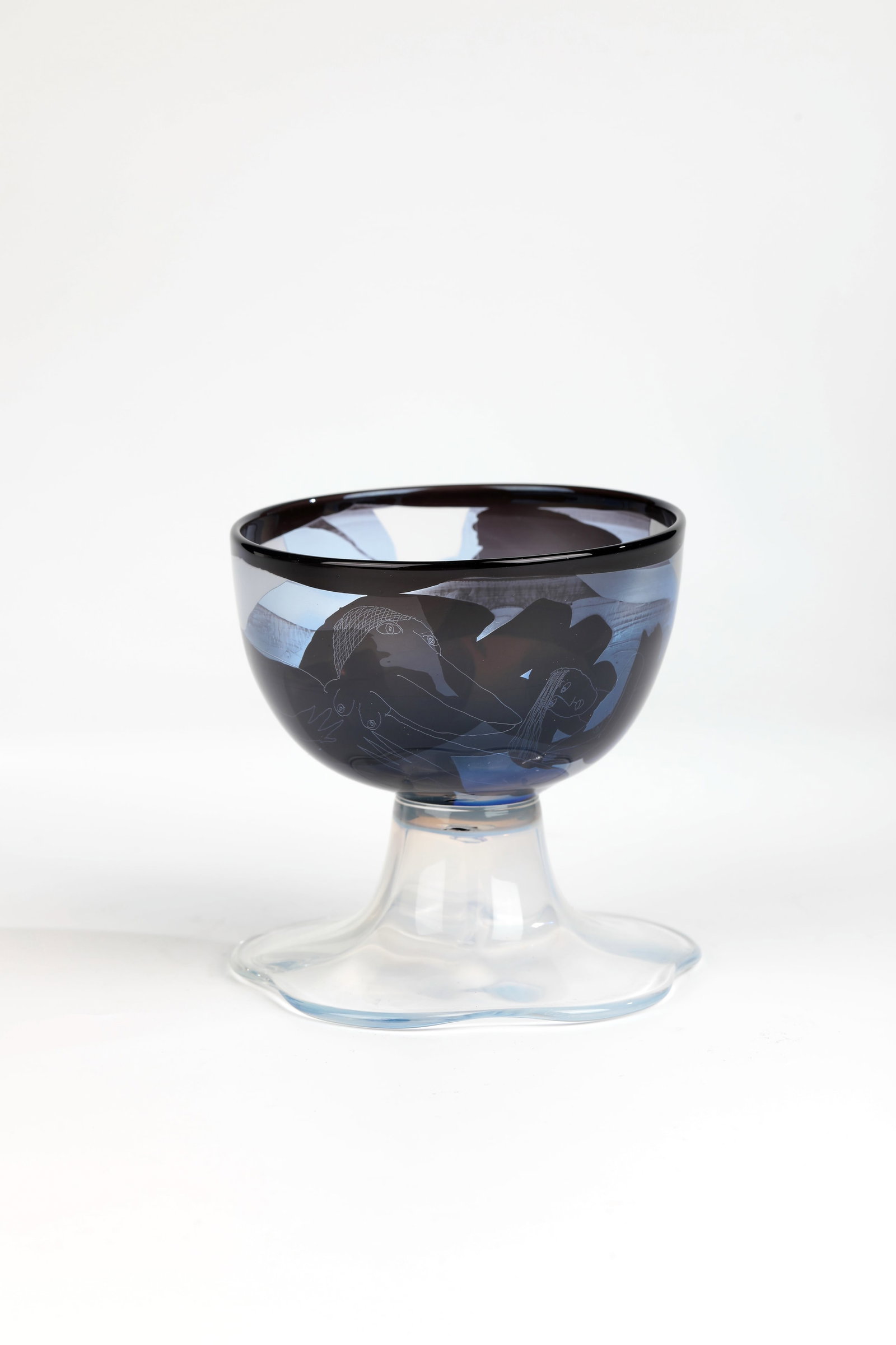 Foot Bowl ''Bird Woman'': Foot bowl ''Bird Woman'' Ann Wärff (design) & Wilke Adolfsson (glassblower), 1981 Colourless glass, blue and violet underlay, sandblasted. Interior drawing in needle etching. the attached foot