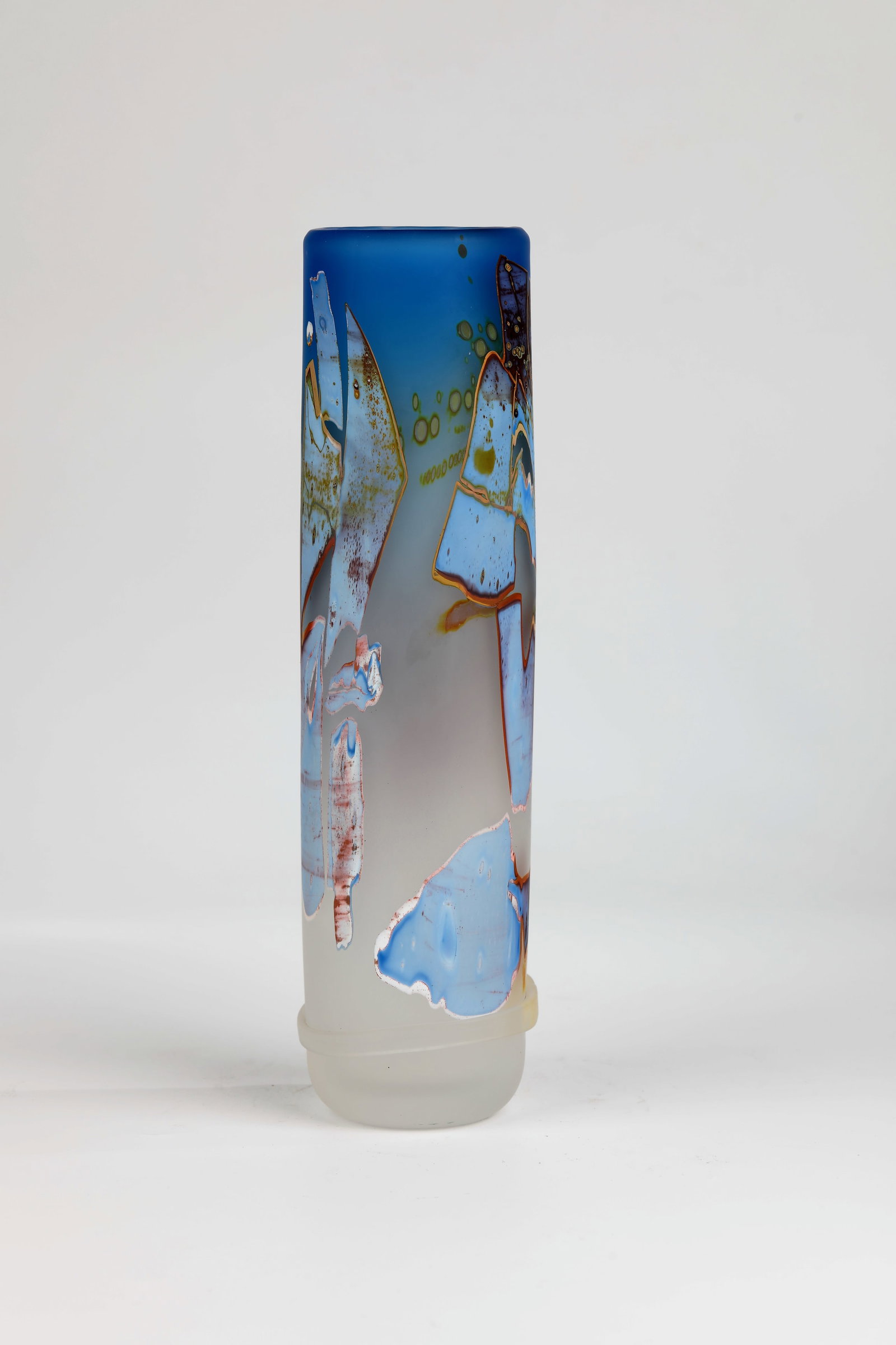 Vase: Vase Louis Leloup, Belgium, circa 1985 Tall cylindrical body. Glass colourless with blue gradient, matt etched. Outer wall with torn patchwork melting in violet, light blue and brownish over