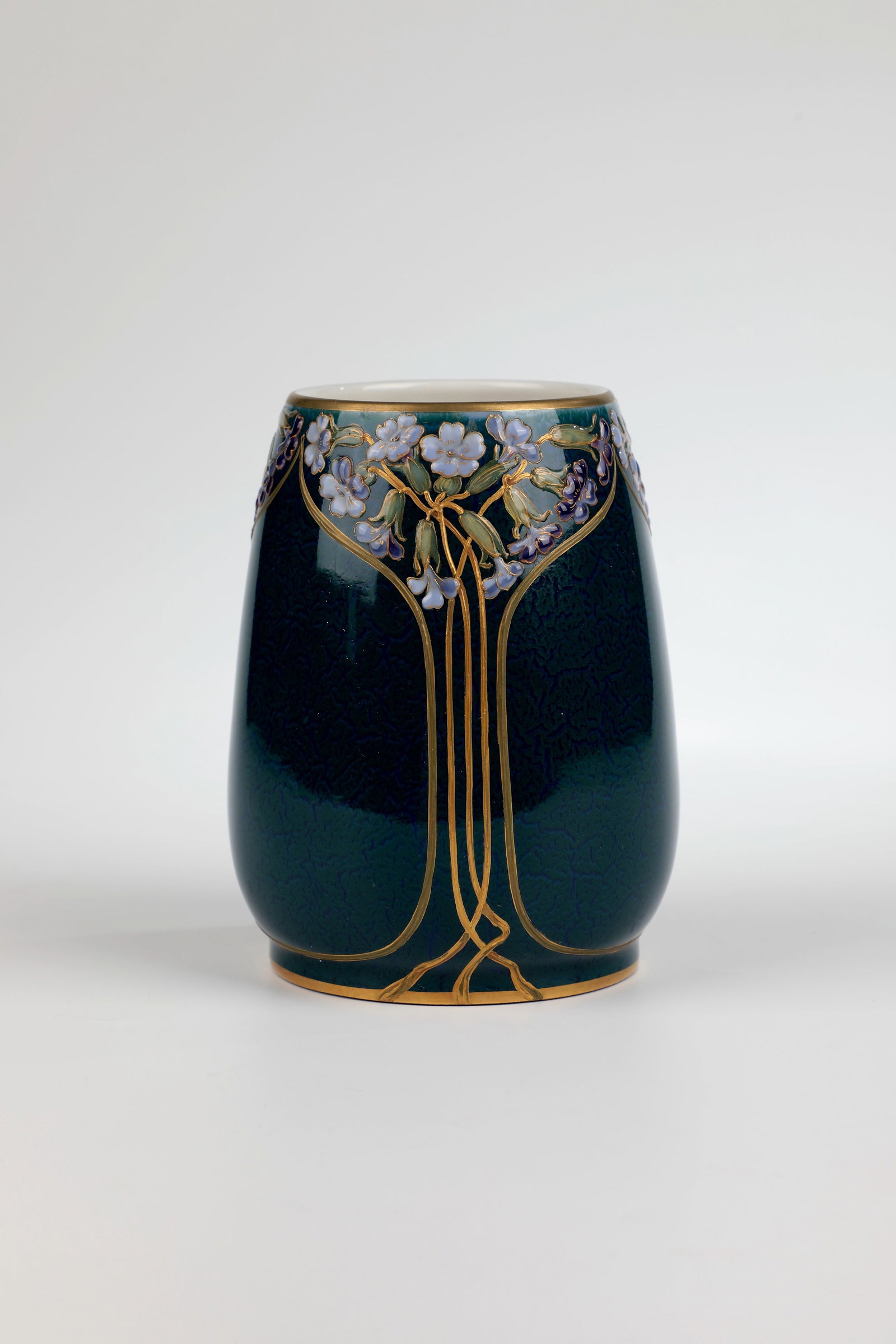 Vessel: Vessel KPM Berlin 1909 On a blue background with green glaze in relief painting Cowslips with golden stems. Gilded stand and muzzle rim. Scepter mark, orb mark, model no. 5690, year letter F, painter
