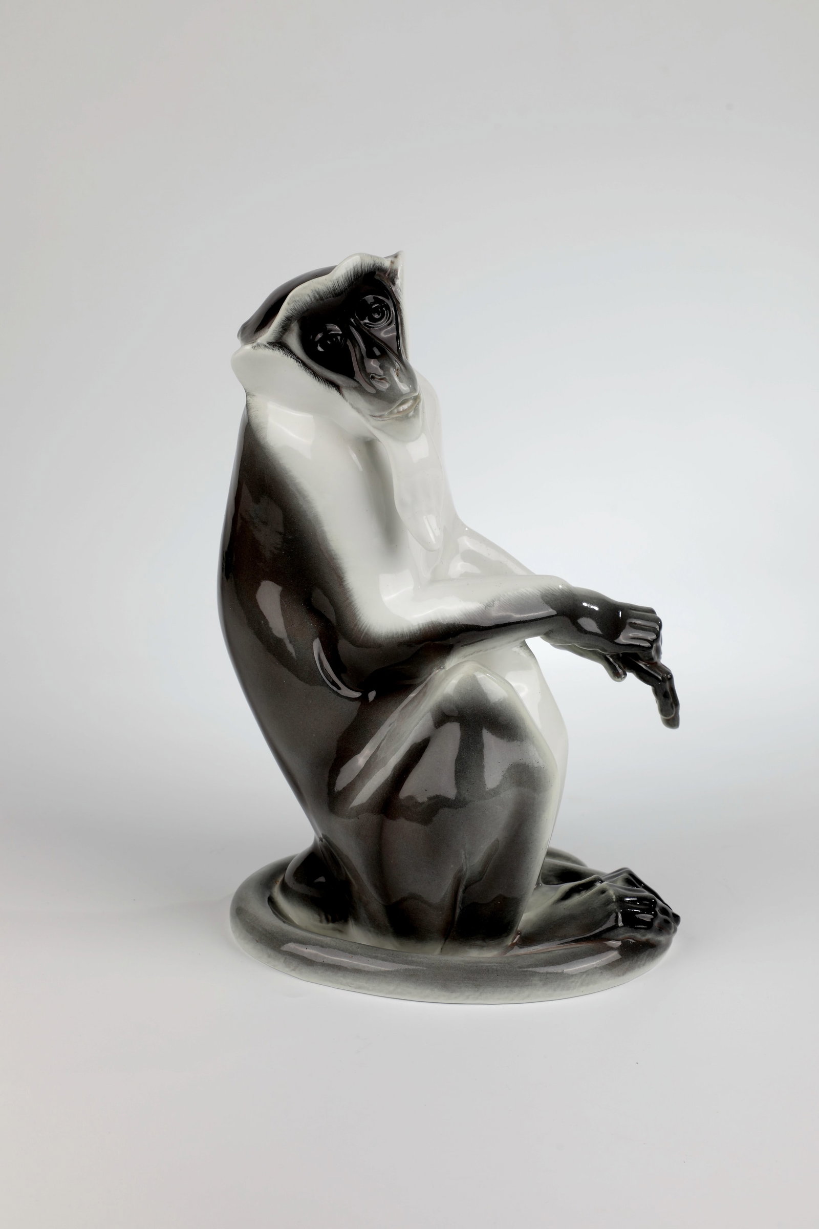 Diana's vervet monkey: Diana Meerkatze designed by Anton Puchegger 1910, KPM Berlin 1922 In naturalistic underglaze painting. On the underside, sceptre mark, orb mark, year letter W and black painter's number 140/429. H.