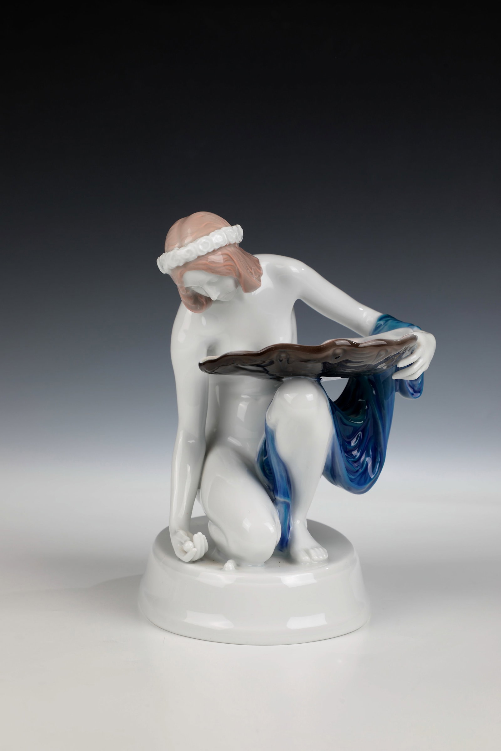 Pearl Seeker: Pearl Seeker Design Karl Himmelstoss 1917, Rosenthal 1931 Kneeling Girl Nude with Mussel Shell, Picking Up a Pearl. Underglaze painting in brown, blue and grey. Artist's signature and manufactory