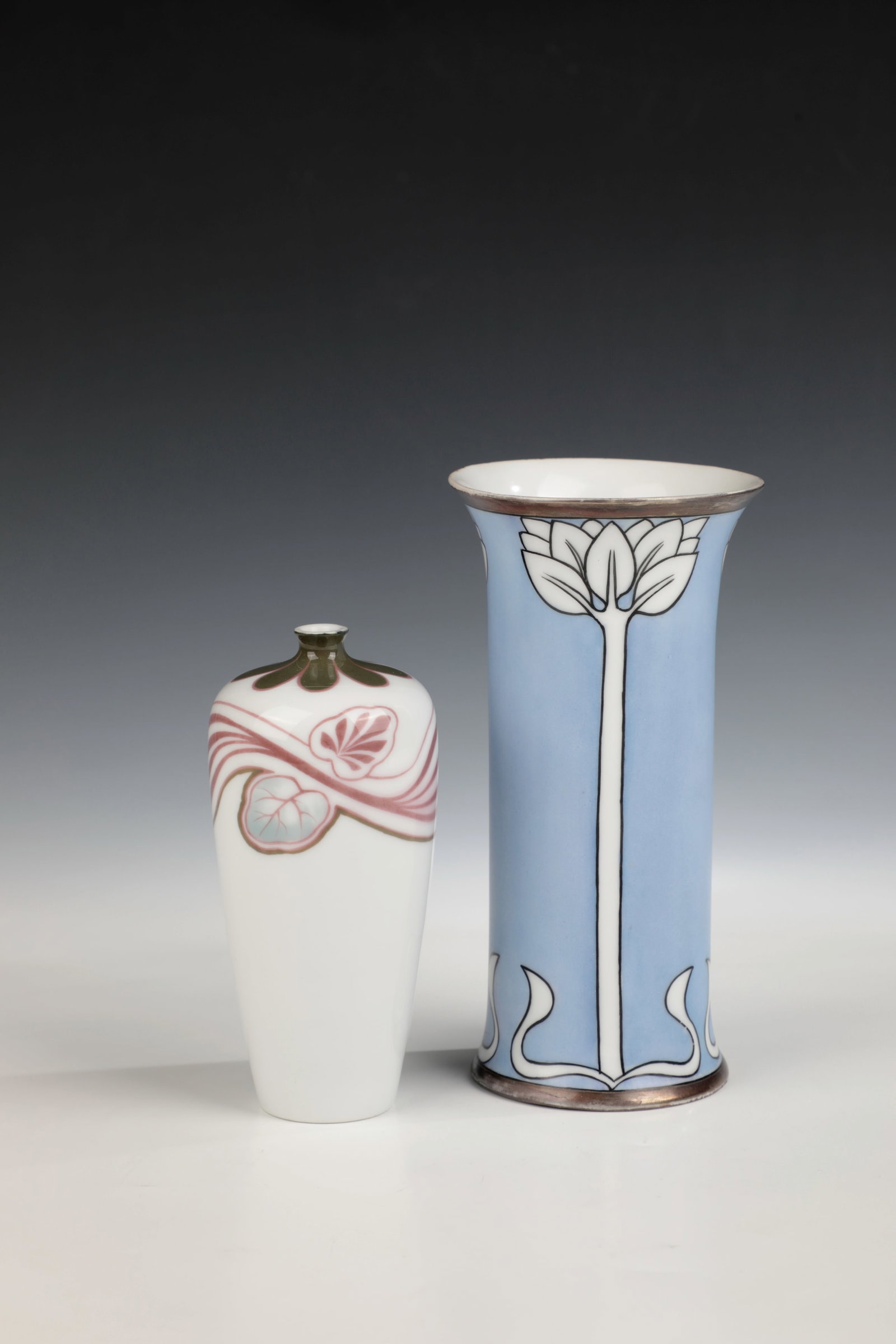 Two vases: Two Rosenthal vases, c. 1900 Slender vase with Art Nouveau ornaments, green stamp and painter's signature. H. 17 cm. Small Solifleur with underglaze painting in green and reddish brown. Green stamp