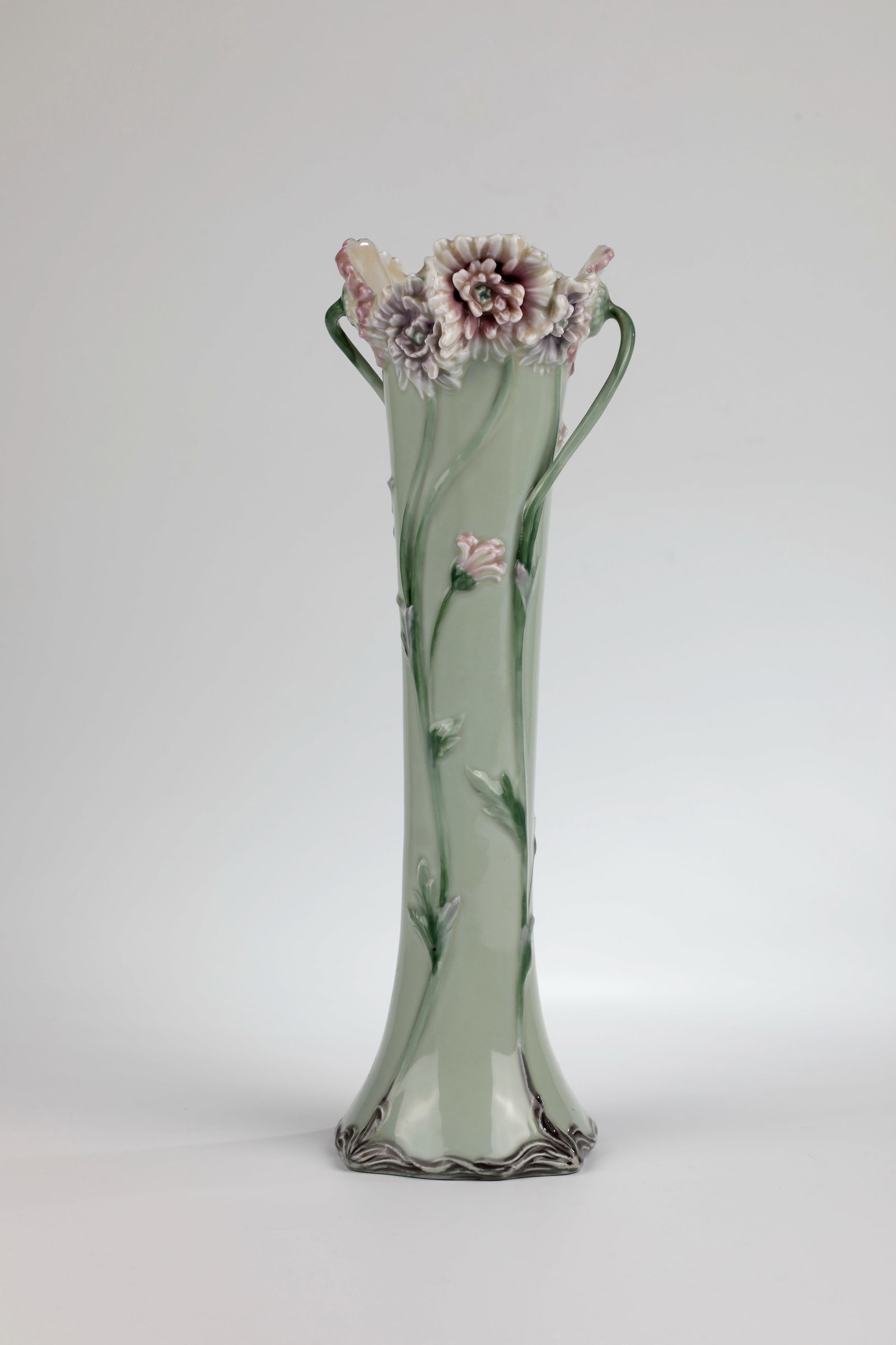 Vase: Vase Gebr. Heubach, Lichte/Thuringia, c. 1900 Slender spindle shape, quatrefoil curved edge. White porcelain shard, glazed, quadruple flower stem motif all around, shaped in relief. The flowers are