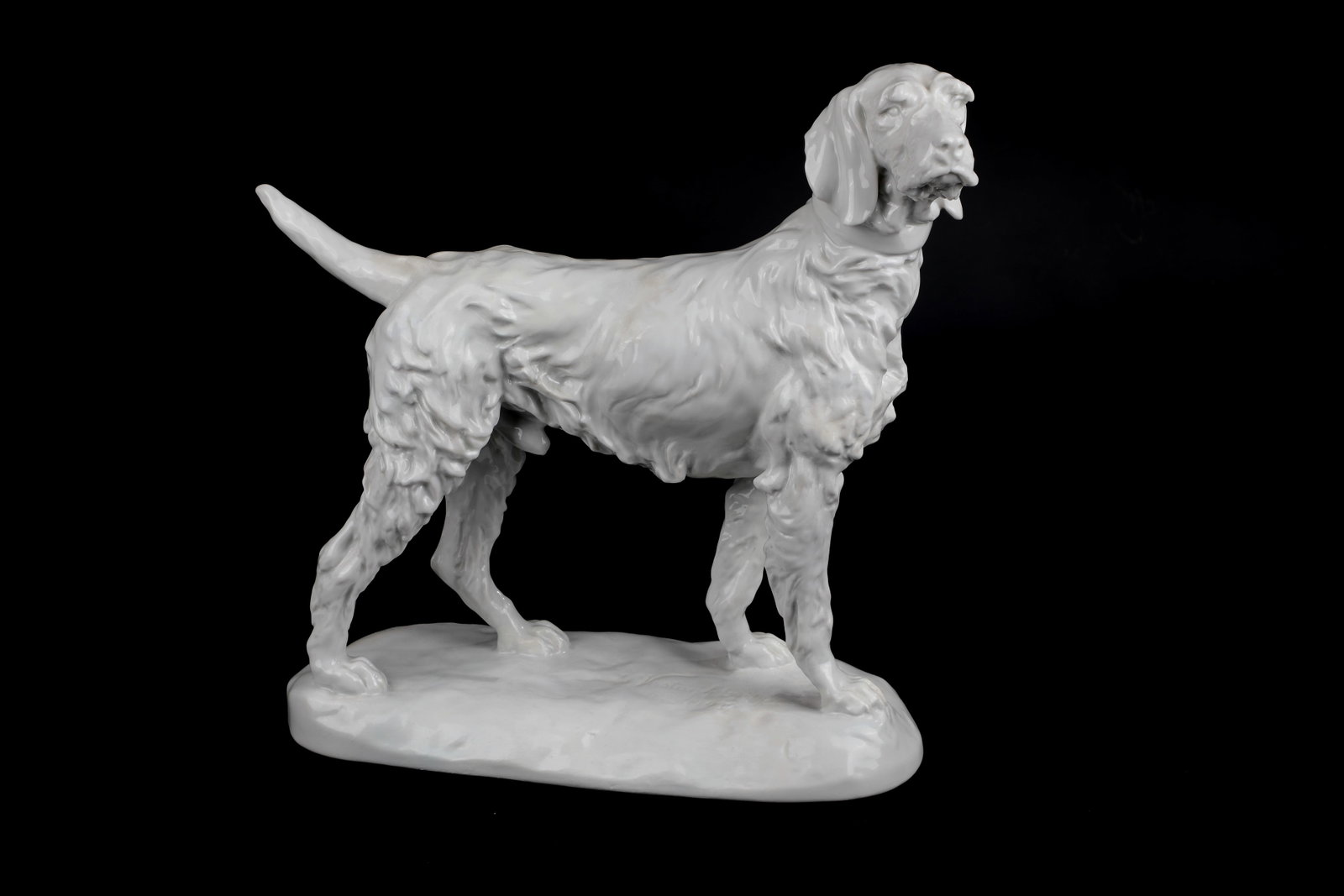 Hunting dog: Jagdhund design Vastagh György, Herend, Hungary, dated 1939 White porcelain. Hunting dog with collar standing on an oval base. Inscribed and dated on the pedestal. In the ground manufactory