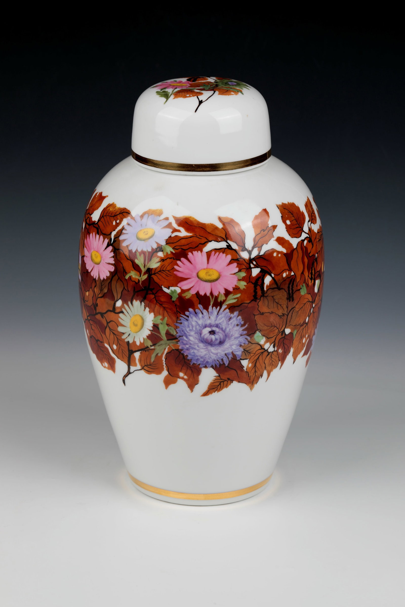 Large lidded vase: Large lidded vase designed by Rudolf Sieck, Nymphenburg early 20th century Bulbous vase with gold rim, polychrome, autumnal decoration of leaves and flowers on the wall and lid. In the bottom