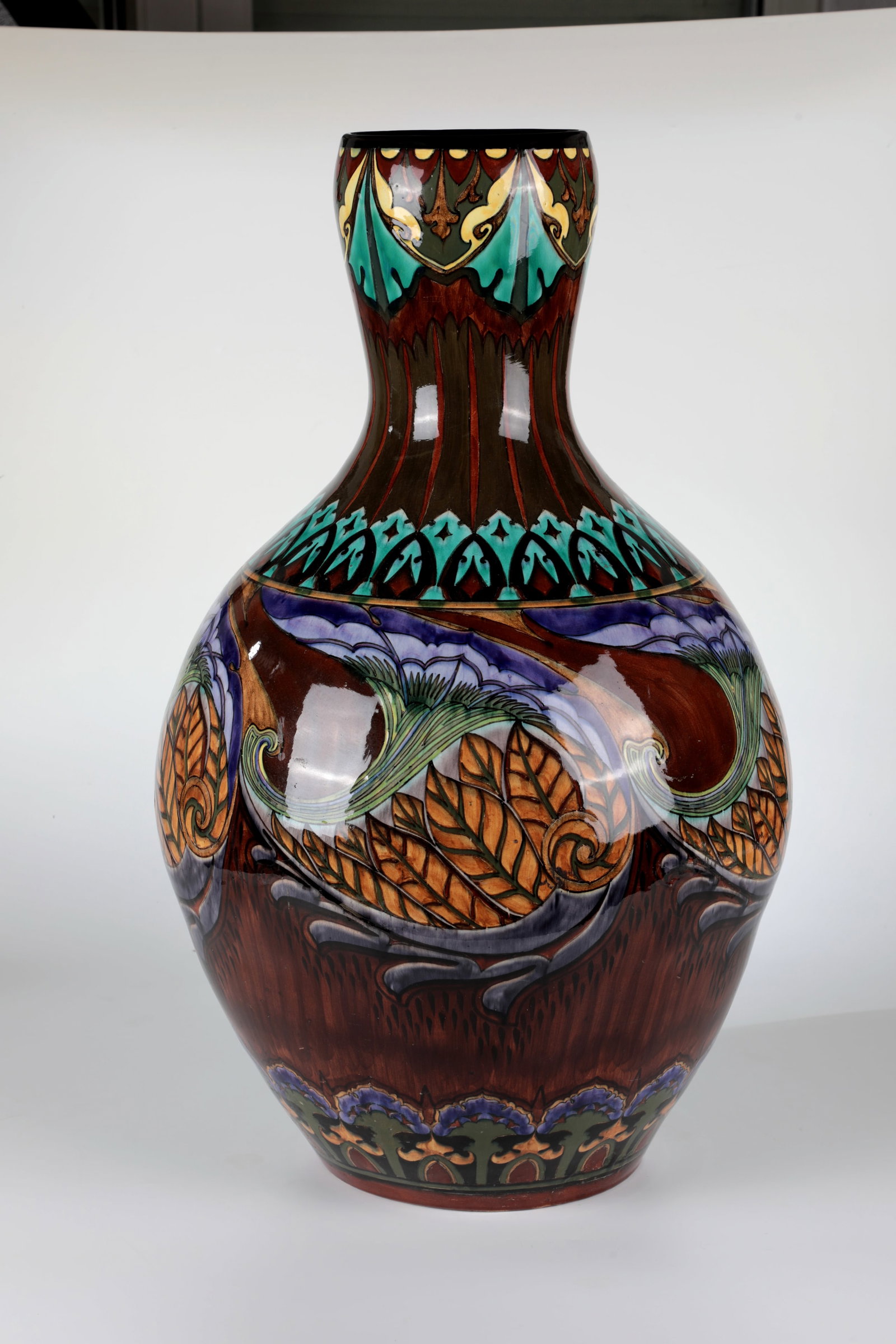 Large Floor Vase: Large floor vase Manufaktur Rozenburg, The Hague, 1896, painter probably Samuel Schellink Faience, polychrome glazed and decorated. Baluster-shaped body with stylized floral and ornamental decoration