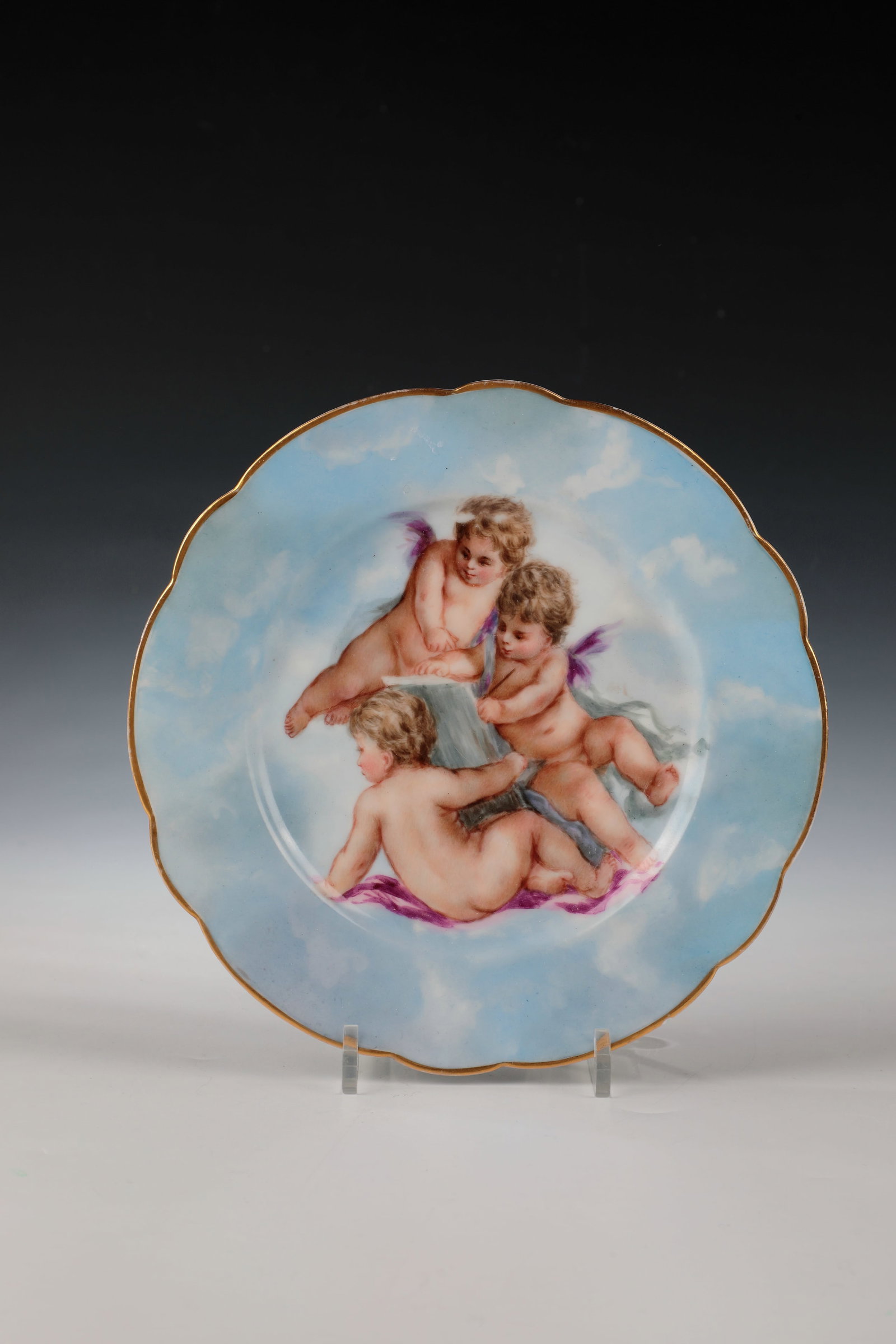 Ornamental plate with three putti (1 of 2)
