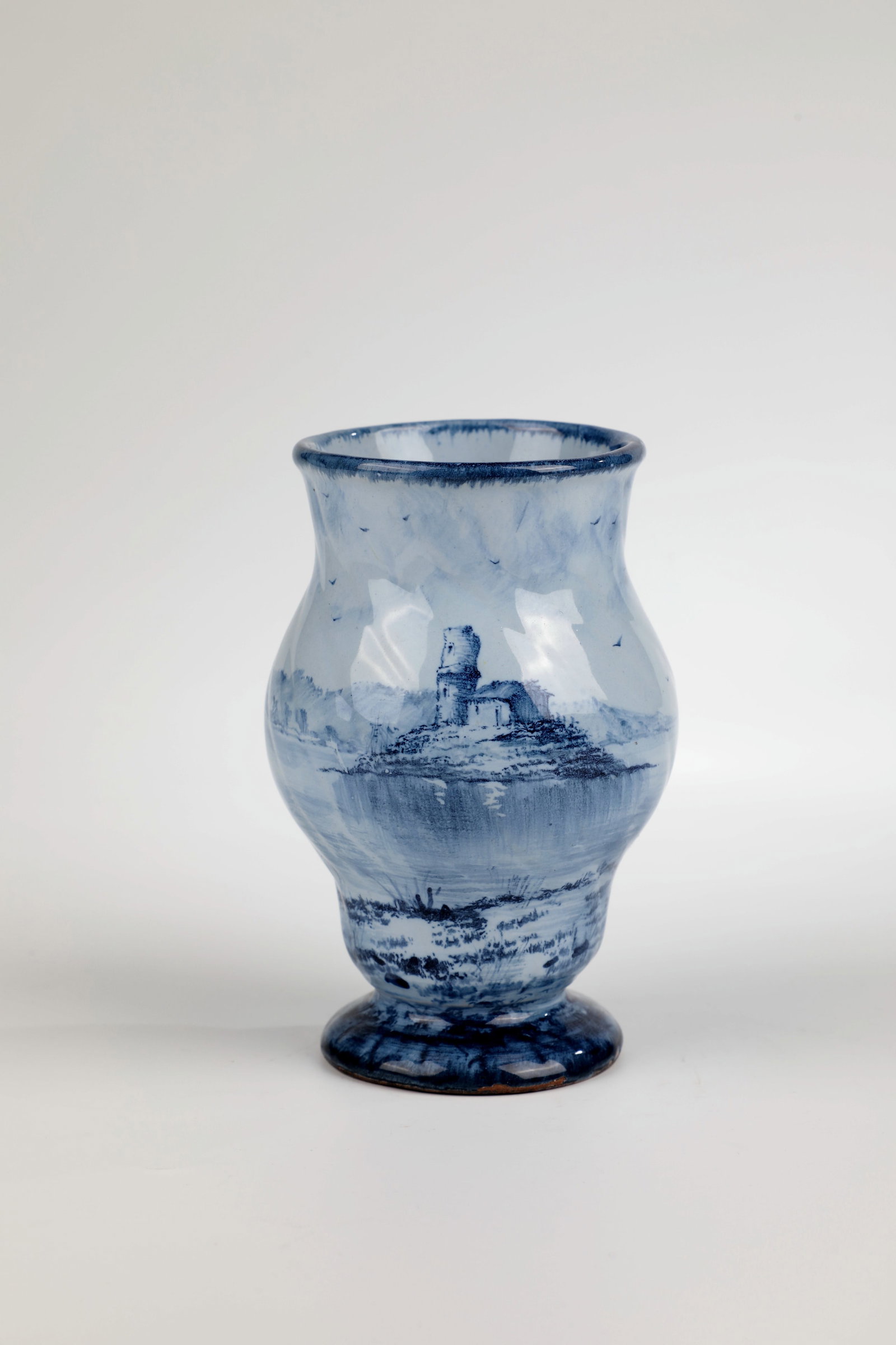 Faience Vase: Faience Vase Emile Gallé, Nancy, c. 1880-1882 Faience, reddish shard, with paste-blue tin glaze. Pear shape retracted in the ground zone on a constricted, arched base. Wide neck and muzzle rim