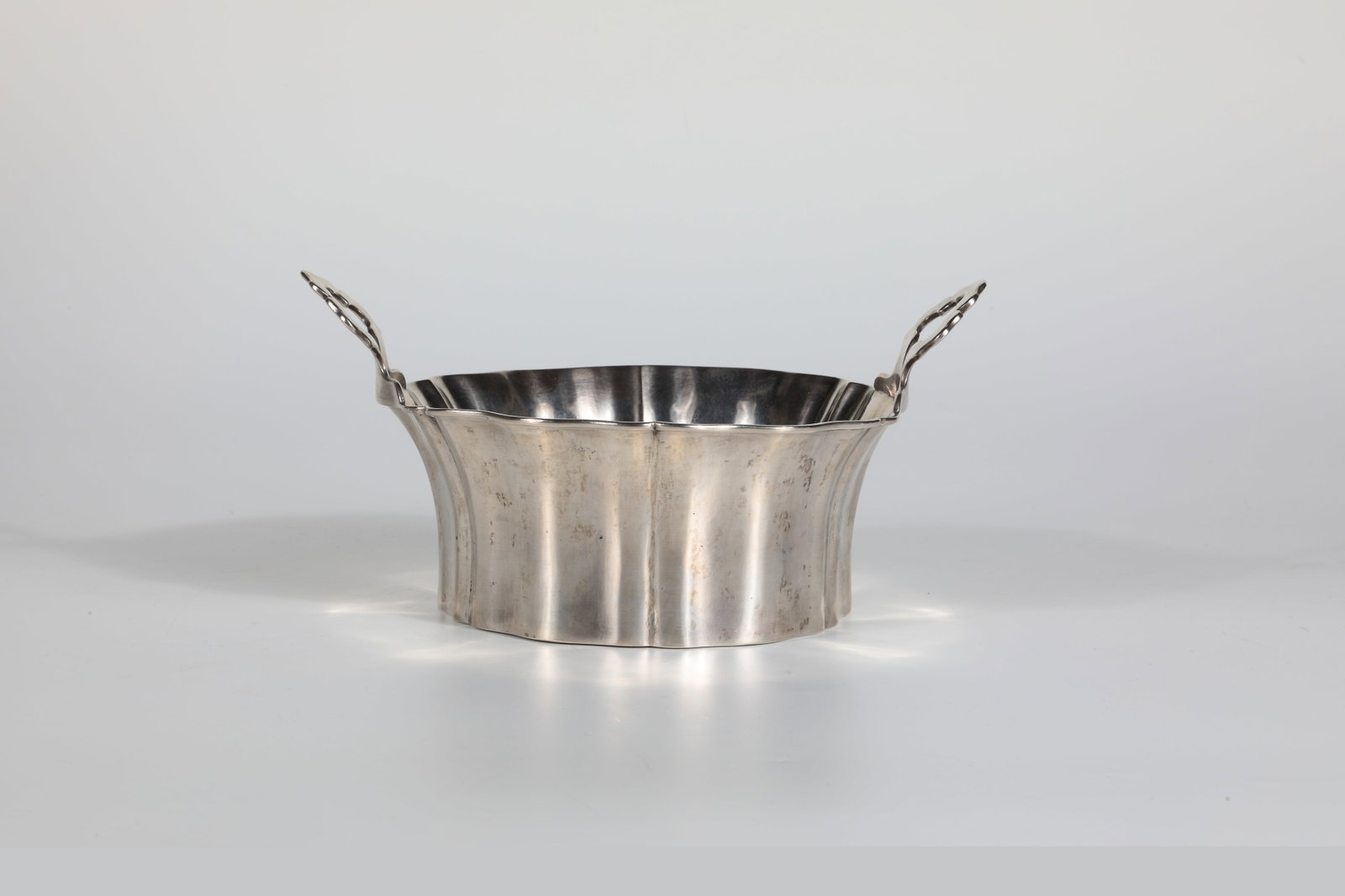 Cream pot: Cream pot Hungary, Pest (Budapest), master György Goszmann, 1852 silver. The smooth wall is structured with vertical folds and with the monogram ''VK'' engraved on the front. One handle on each