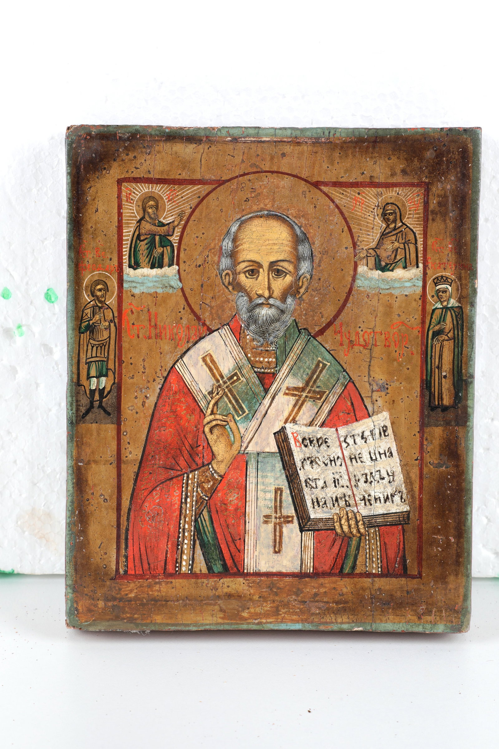 Icon of St. Nicholas the Wonderworker: Icon of St. Nicholas the Wonderworker, Russia, E. 18th/early 19th century, tempera on chalk ground above wooden panel with two sponki on the back. In front of a gold background, Saint Nicholas is depi