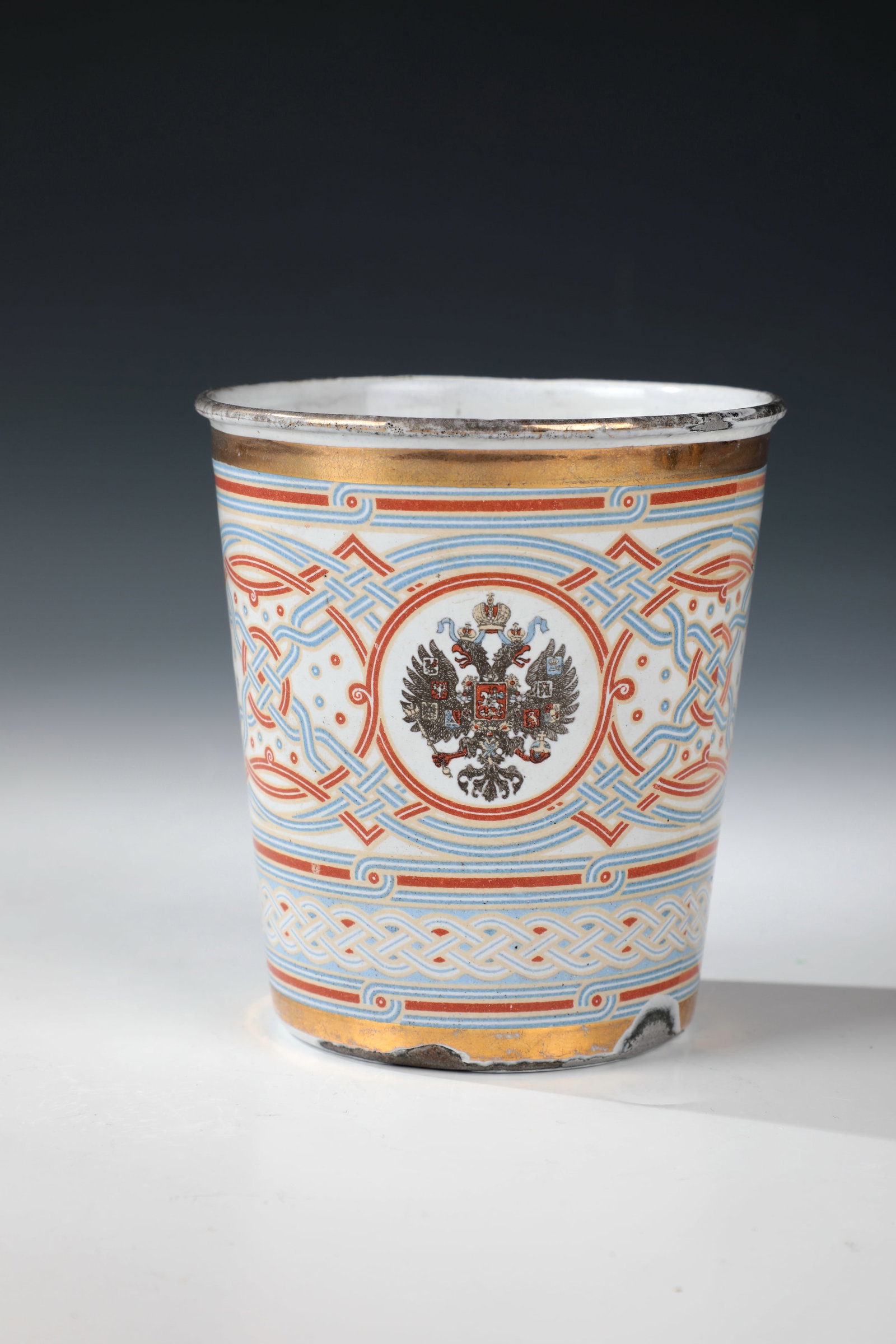 Coronation cup: Coronation cup Russia, 1896 metal, enamelled. Conical shape. On the wall framed by red and blue braided bands medallion with the monogram ''NII'' under crown with the date ''1896'' and the