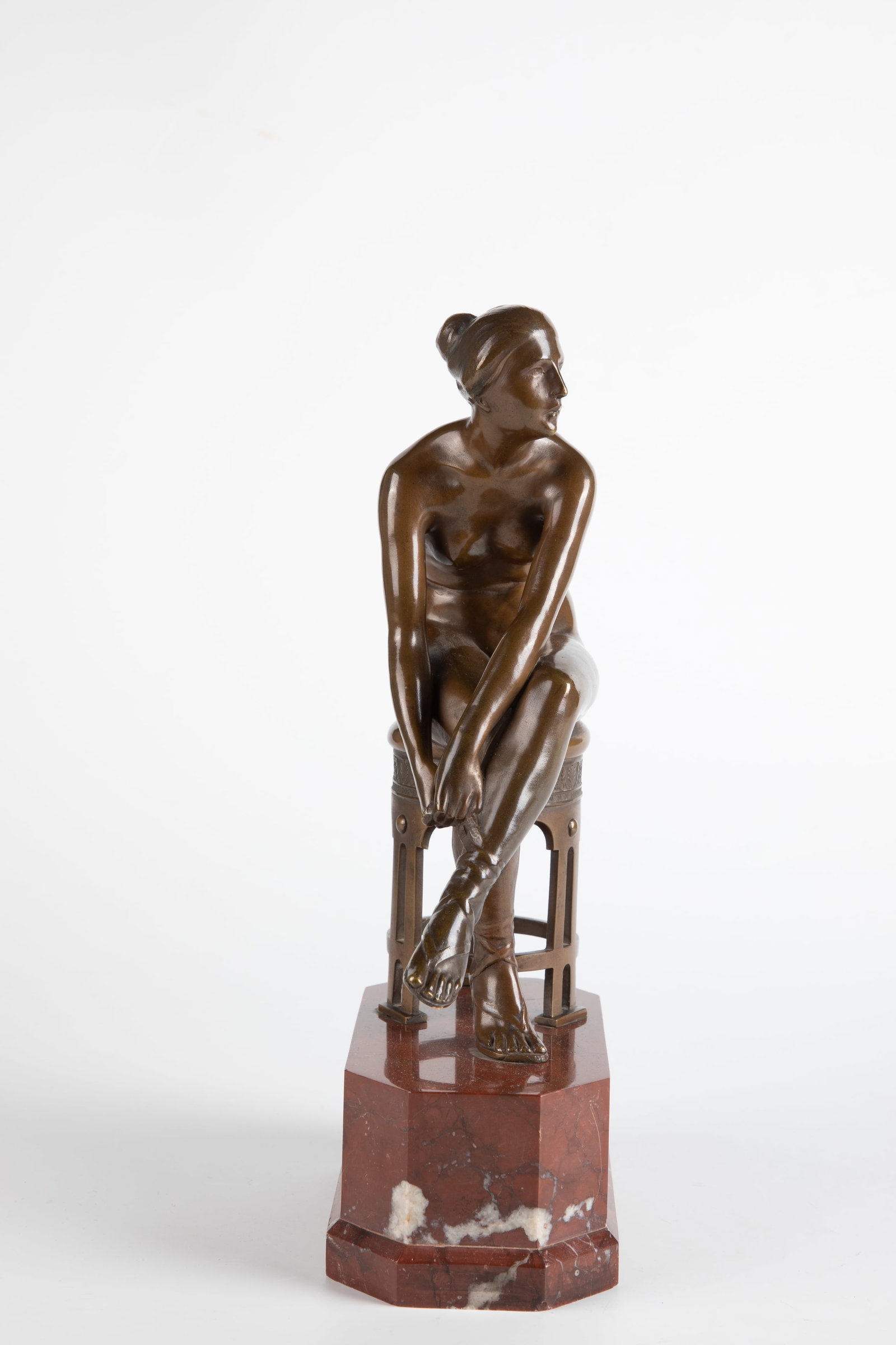 Miniature figure on a high pedestal: Miniature figure on a high pedestal, presumably. South Africa, 19th/20th century South African miniature figure, mounted on a high pedestal. The hollow base is filled or closed with wood at the bottom