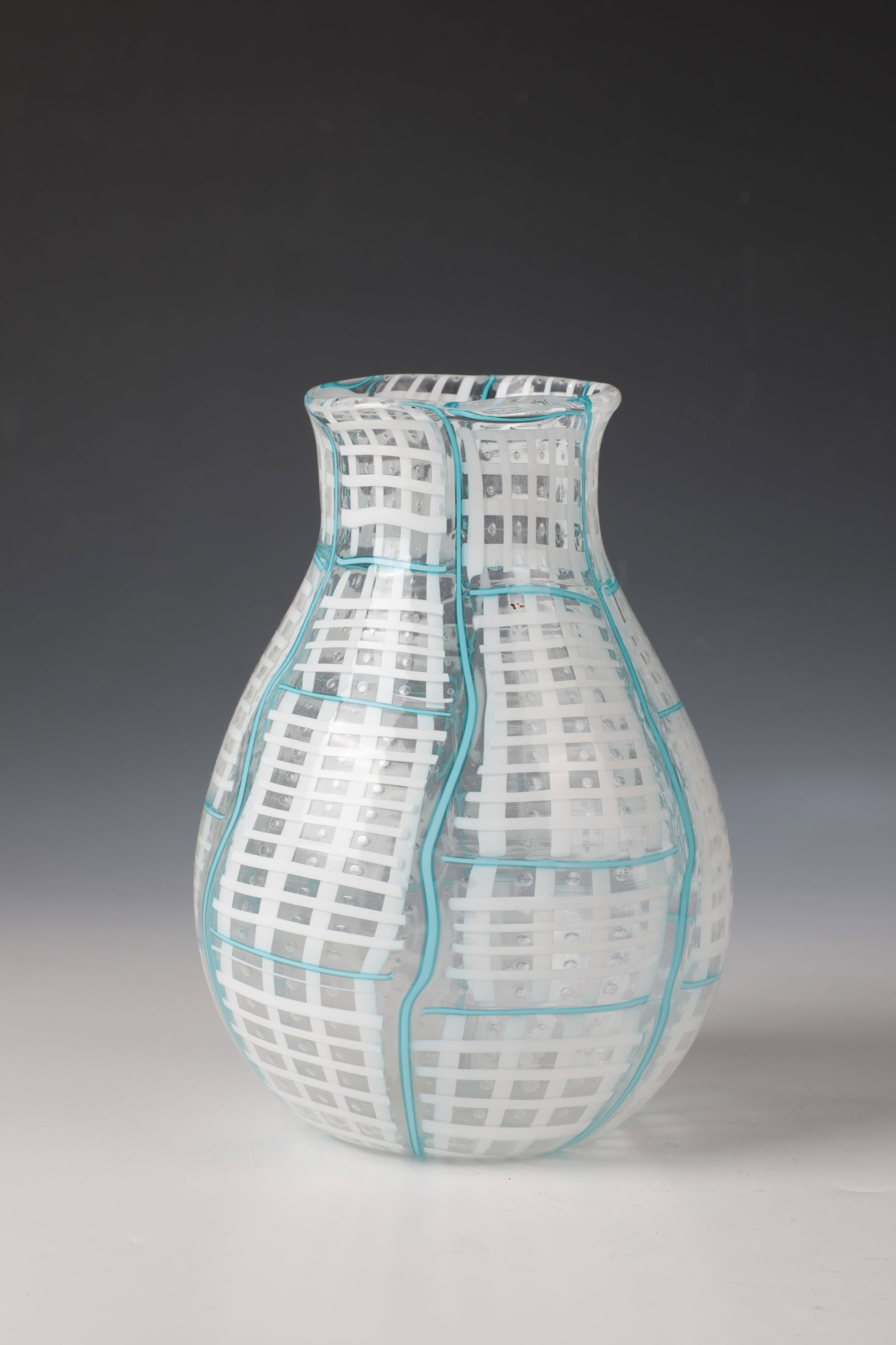 Vase: Vase Angelo Ballarin, Murano Colorless glass. Interlayer décor made of net-like melted glass plates made of opaque white glass with incorporated air bubbles. Each framed by opaque turquoise