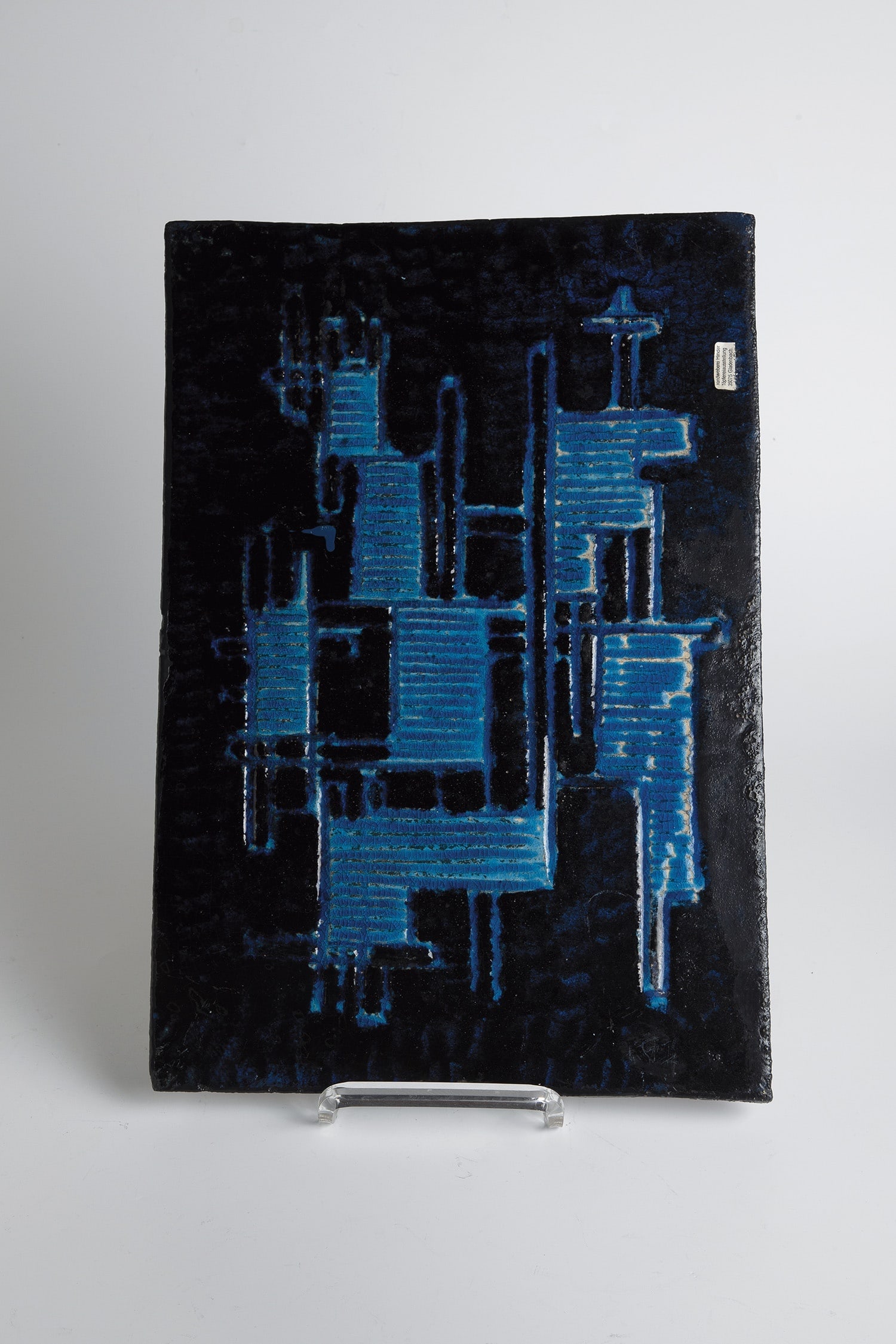 Ceramic Mural: Ceramic mural Hildegard Storr-Britz, Höhr-Grenzhausen, around 1970 Ceramics. Abstract overlapping layers in shades of blue. Iridescent surface. Provided with various adhesive labels on the back.