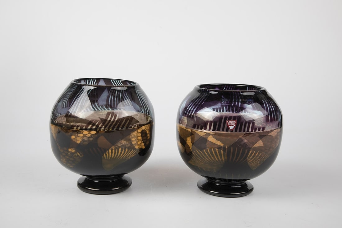 Pair of Vases ''Contrast II'': Pair of vases ''Contrast II'' Eva Englund (design), Orrefors, 1988 Colourless glass, honey yellow and violet overlay. Decor worked in the Graal technique, then reheated and colourlessly pierced. The