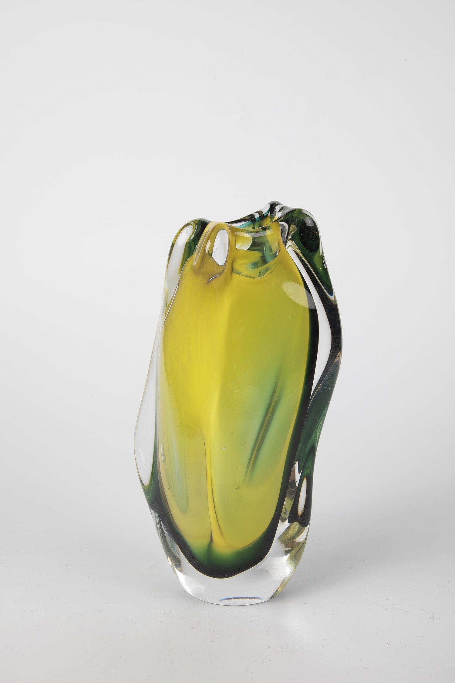 Vase: Vase Floris Meydam (design), Glasfabriek Leerdam, 1955 Colourless, thick-walled glass with underlays in lemon yellow and dark green. Organically curved wall, freely formed. Underside inscribed in diam