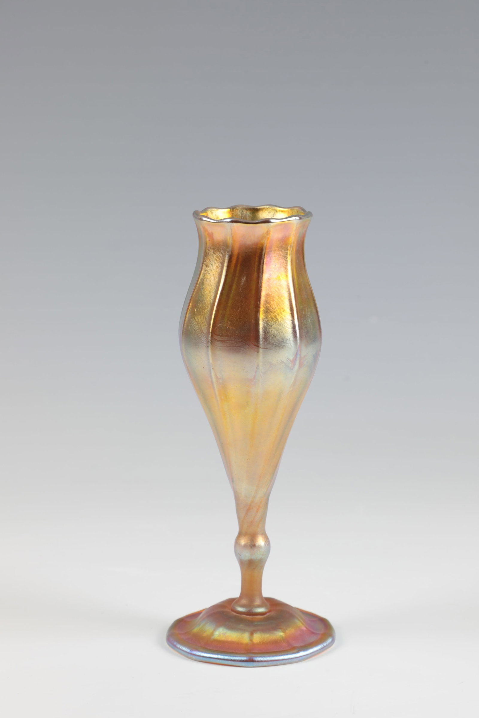 Vase ''Floriform'': Vase ''Floriform'' Louis Comfort Tiffany, New York, 1905 Colourless glass, stained silver-yellow over the surface. Iridescent. Inscribed in the bottom: 1523 - 6512 L L.C. Tiffany - Favrile (engraved).