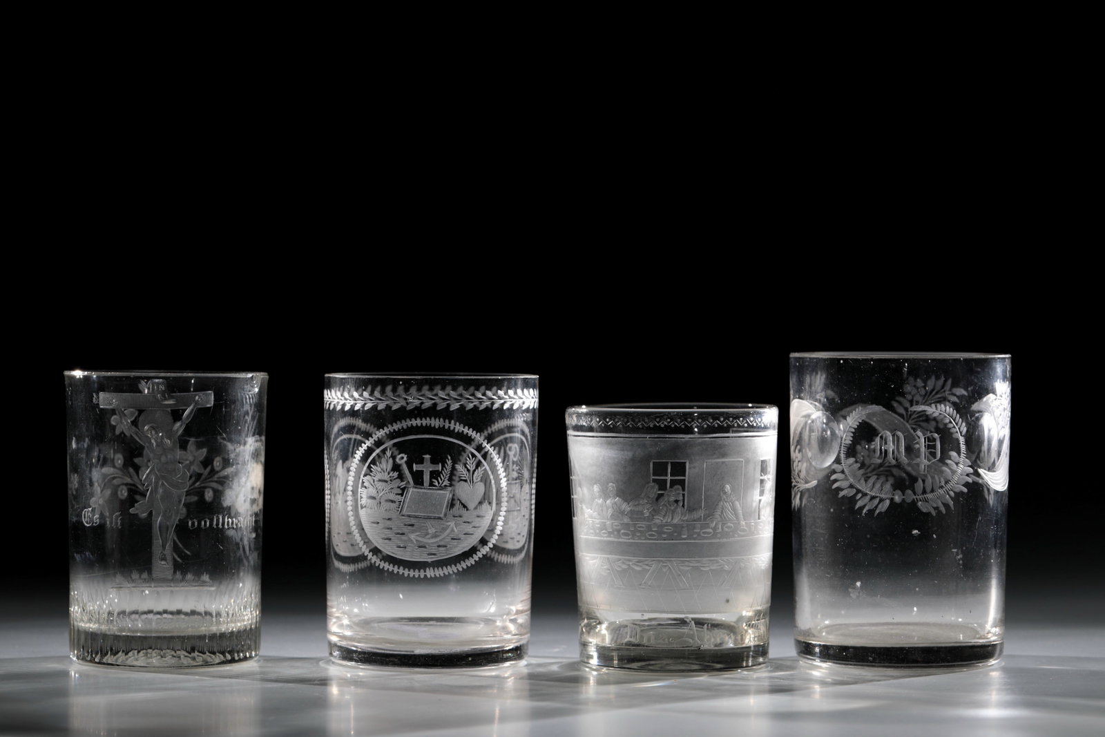 Mixed lot of four cylinder cups: Mixed lot of four cylindrical beakers 18th /19th century Colourless, partly greyish tinted glass. Two with a ground outline. Finely engraved representations and floral decoration on the cylindrical