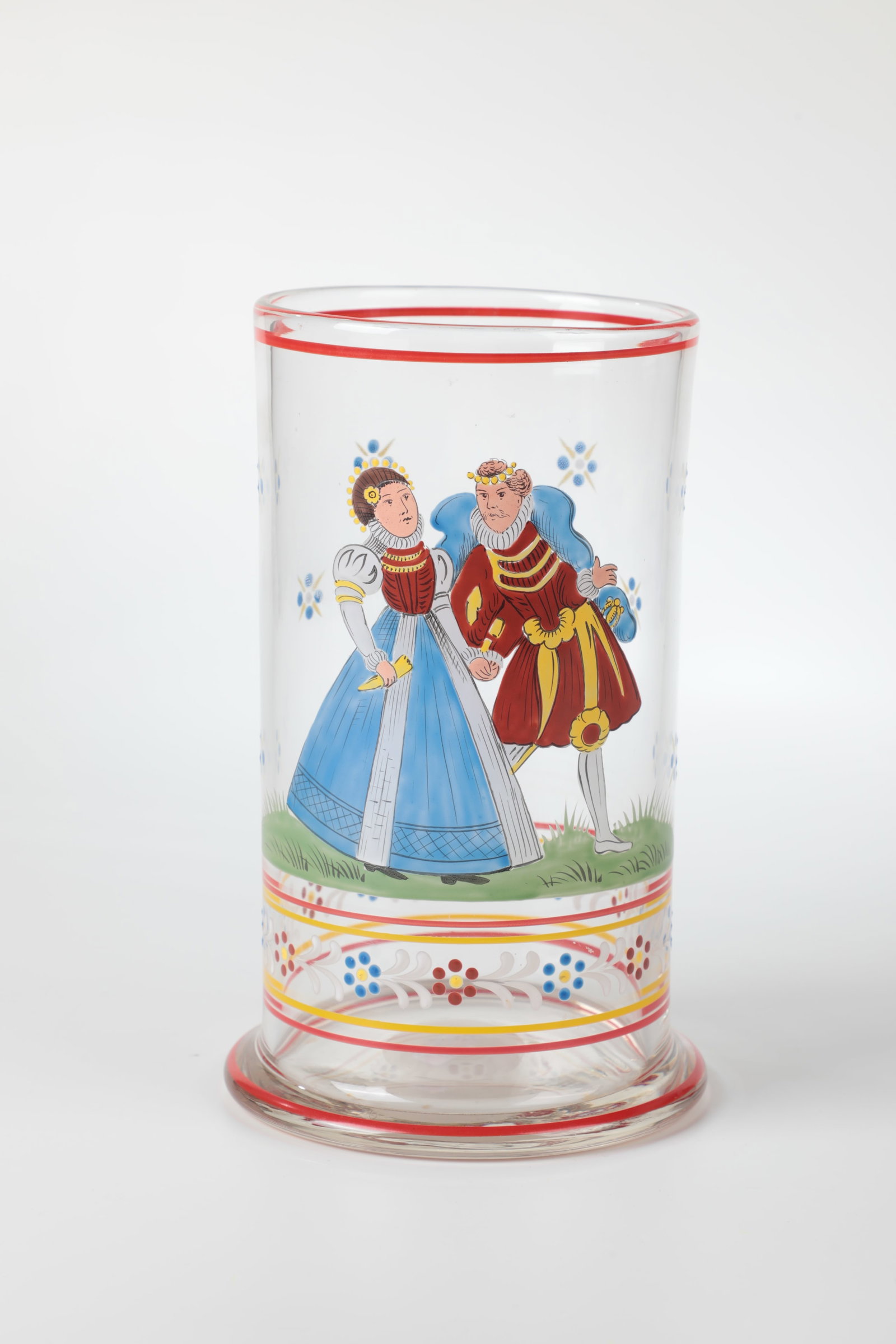 Wedding tankards: Wedding tankards, 20th century, Colourless glass with polished tear-off. On the cylindrical wall in polychrome enamel painting noble wedding couple. H. 20.5 cm Hochzeitshumpen 20. Jh. Farbloses Glas