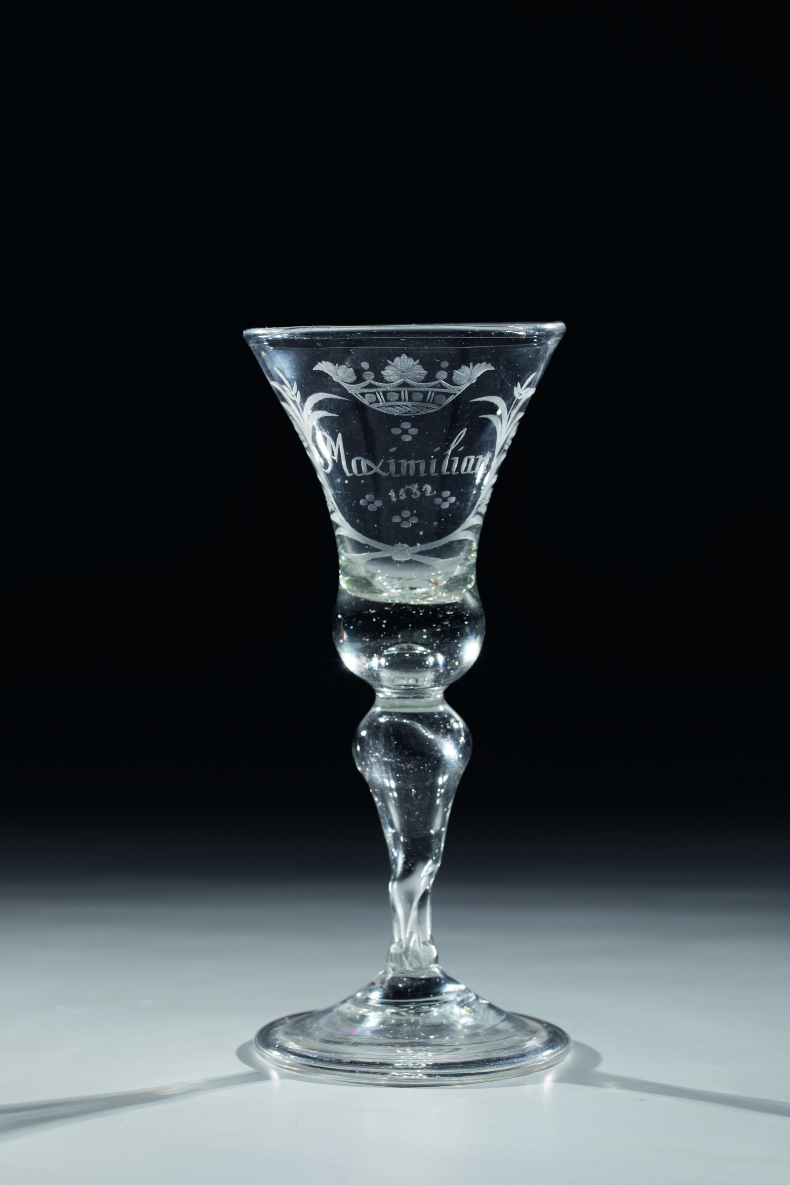Cup ''Maximilian'': Goblet ''Maximilian'' German, 18th century Raised foot with the edge turned downwards. Hollow baluster shaft slightly deformed at the base. Bell-shaped cuppa with crowned inscription ''Maximilian''