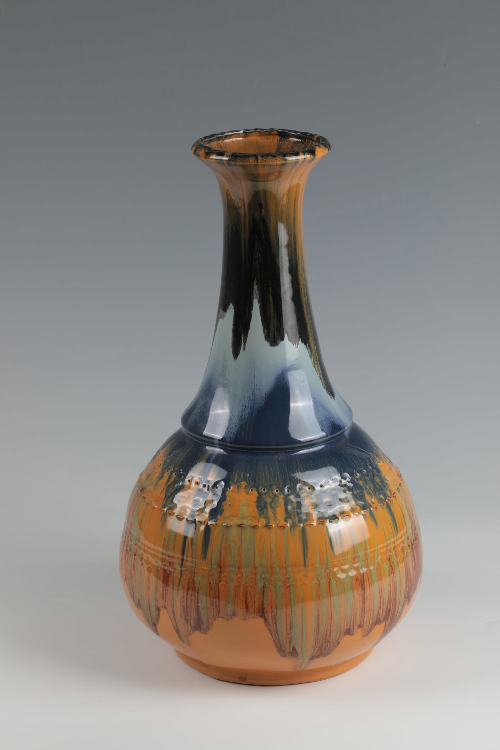 Vase Studio Ceramics: Vase Studio Ceramics Italy or Yugoslavia, M. 20th Century Hand-turned ceramic with strong running glaze in shades of blue, green and ochre. Unglazed stand ring with illegible brush signature. H. 34
