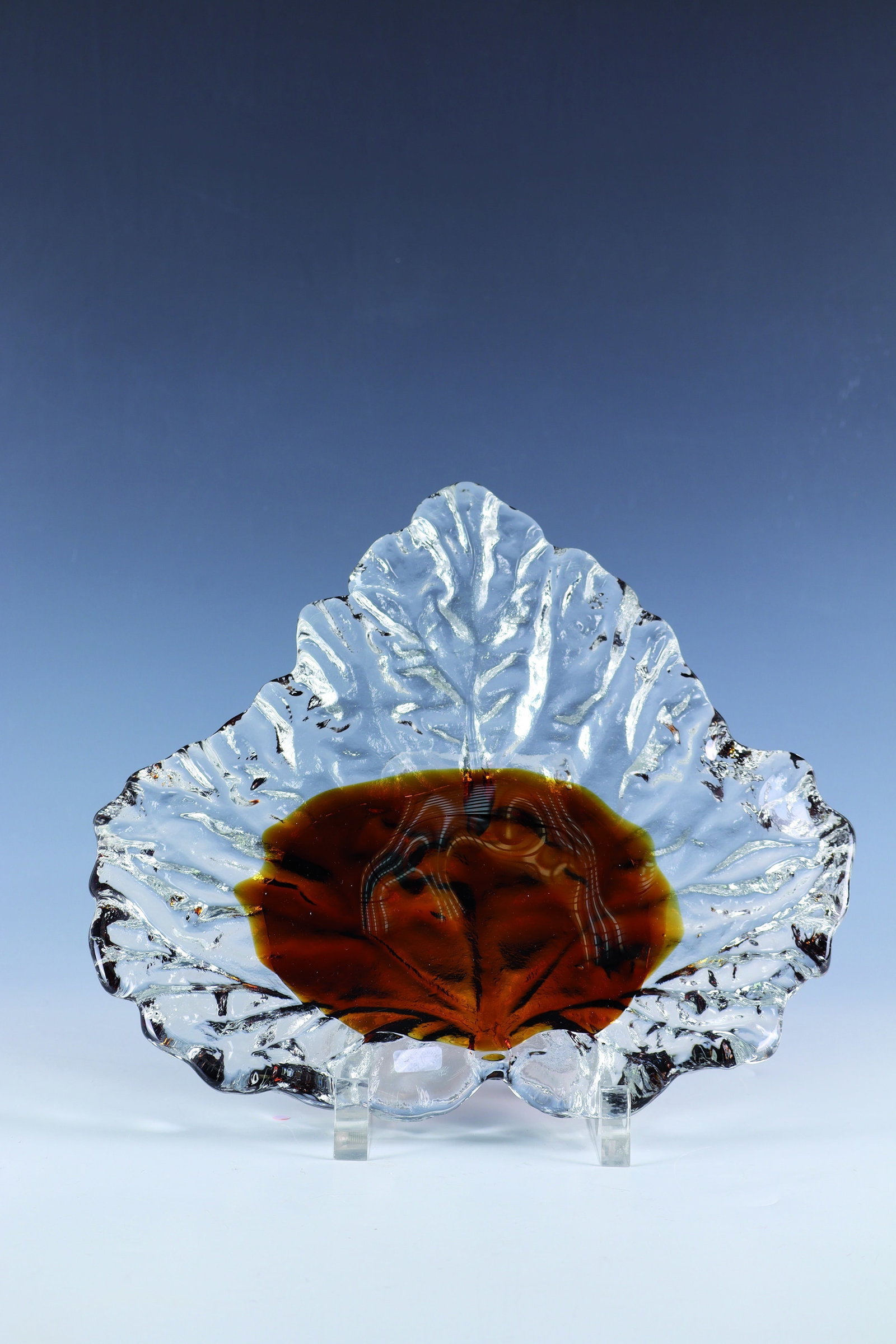Leaf shell: Leaf Bowl Pertti Santalahti (Design), Humppila, Finland, 1970s Colorless glass with amber partial underlay, molded, partially polished. Underside inscribed in engraving: Pertti Santalahti c. Humppila