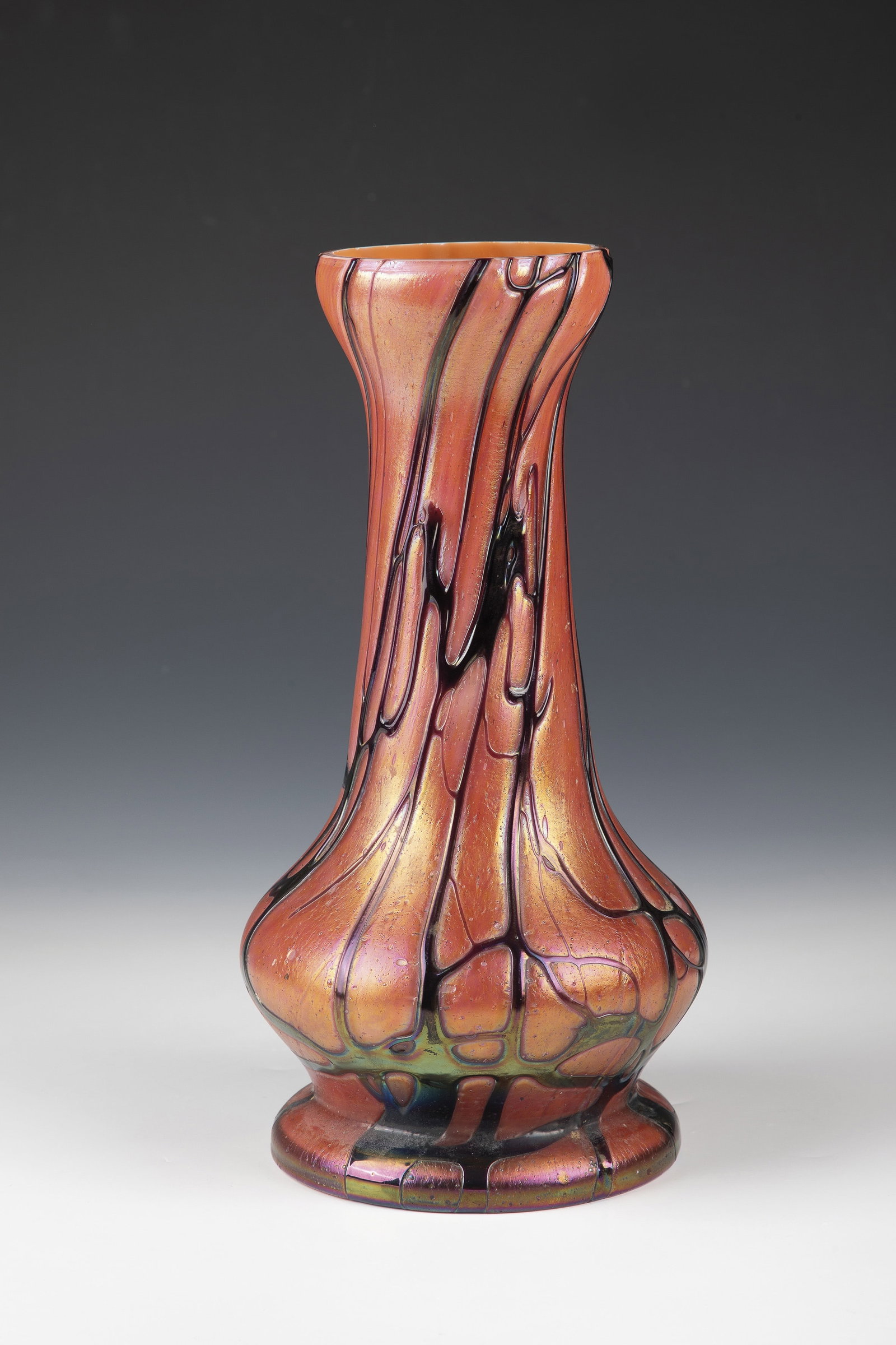 Vase: Vase glass factory Elisabeth, costs near Teplitz, 1900-03 White opal glass underlay. The colourless top layer with ruby-pink powder melting and black-violet threads spun like a net. Iridescent. H. 30