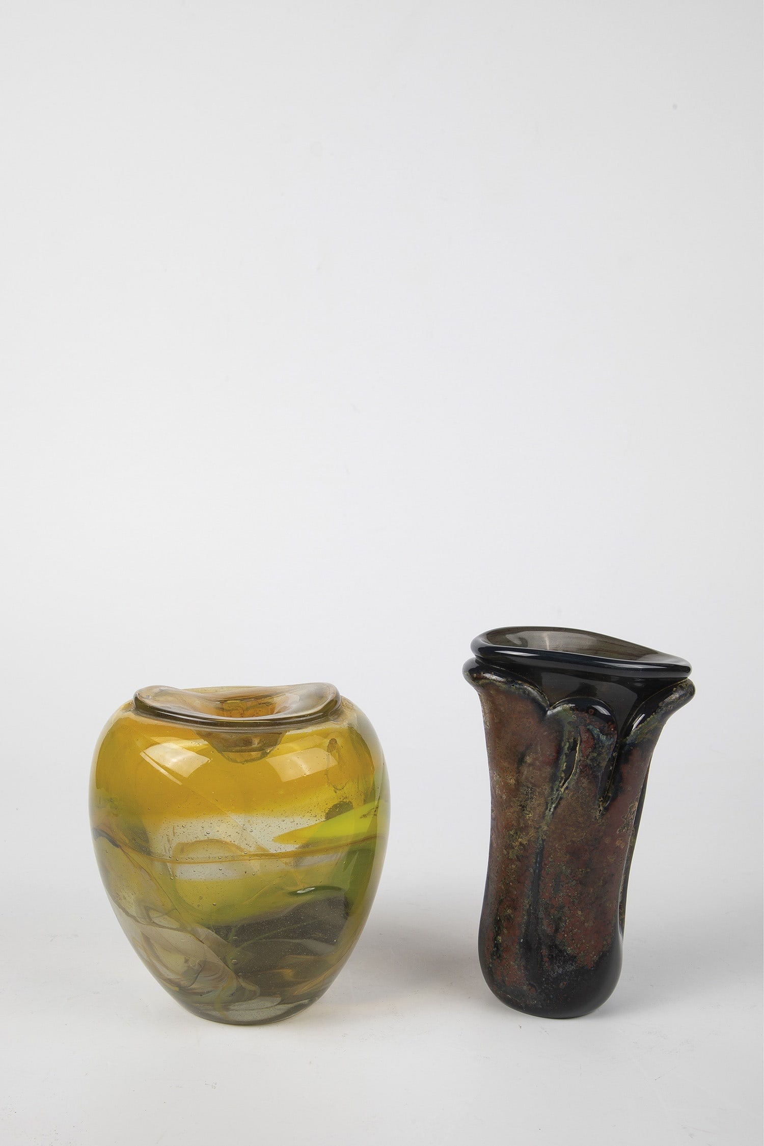 Pair of vases: Pair of Vases Michael Boylen, Vermont, 1970s Colorless glass, polychrome color inclusions in shades of yellow and brown between layers. Free-set, pressed neck made of colourless glass. Smoky brown