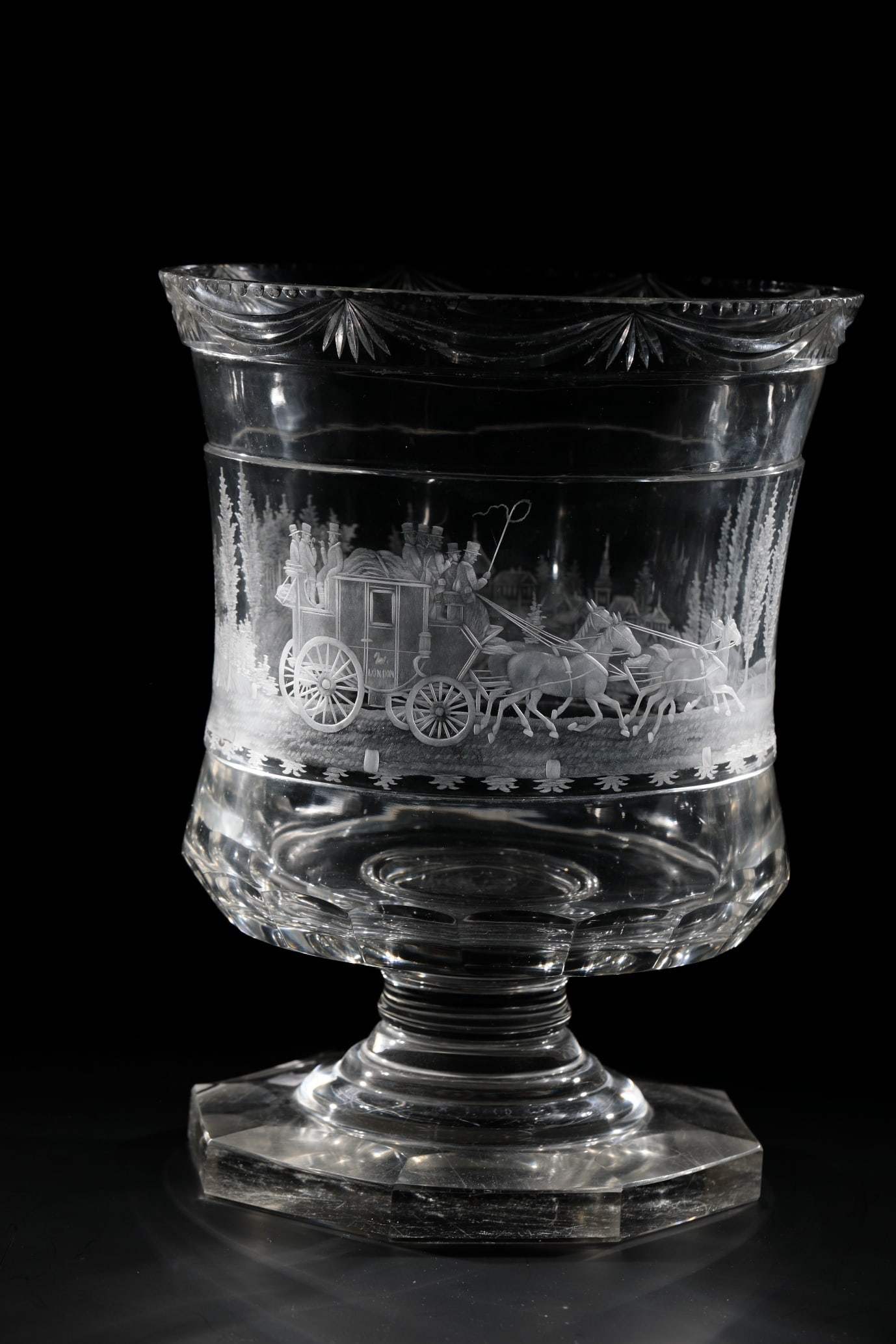 Large Foot Vase with Stagecoach: Large foot vase with stagecoach Bohemia, probably for the English market, 19th century. Octagonal foot. Finely cut scene all around the slightly waisted wall: London stagecoach in tree-lined