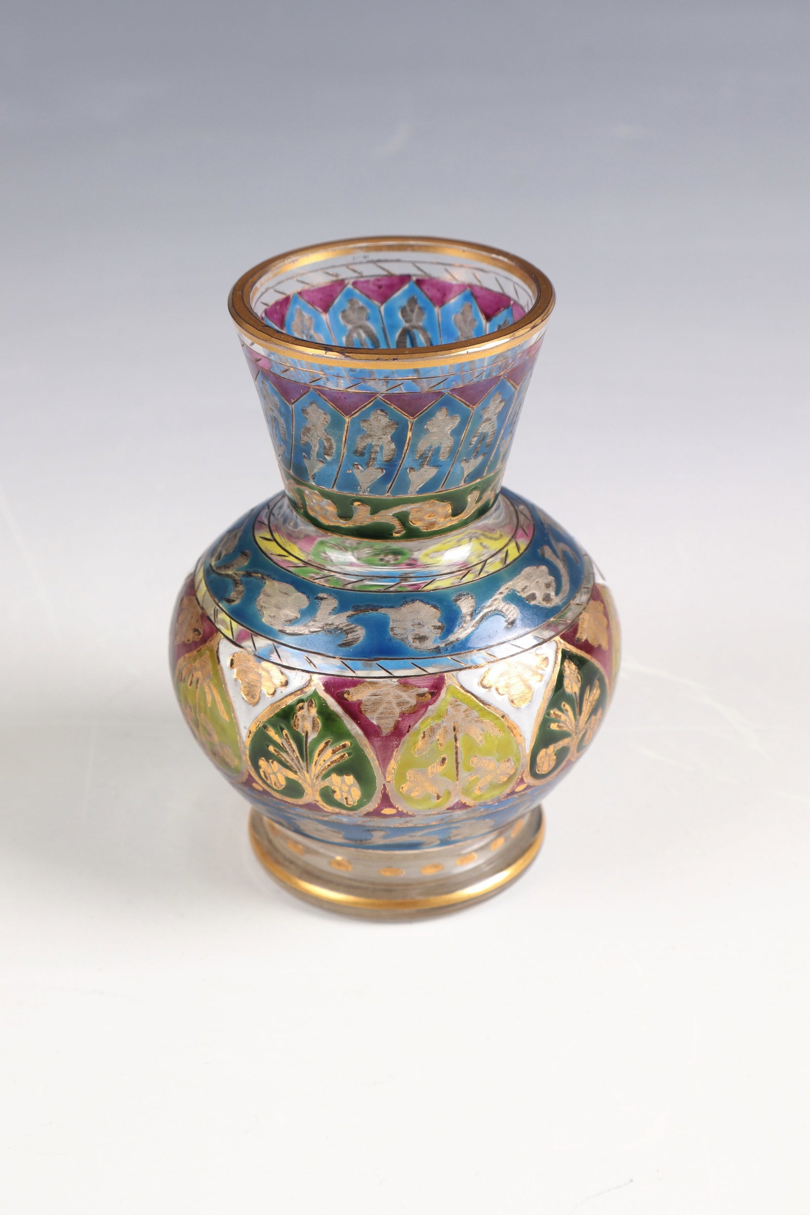 Small spherical belly vase Jodphur: Small spherical belly vase Jodphur Fritz Heckert, Petersdorf, c. 1880 Colourless glass with flat engraved decoration painted in polychrome transparent enamel, silver and gold: Jodphur. Stand and lip e