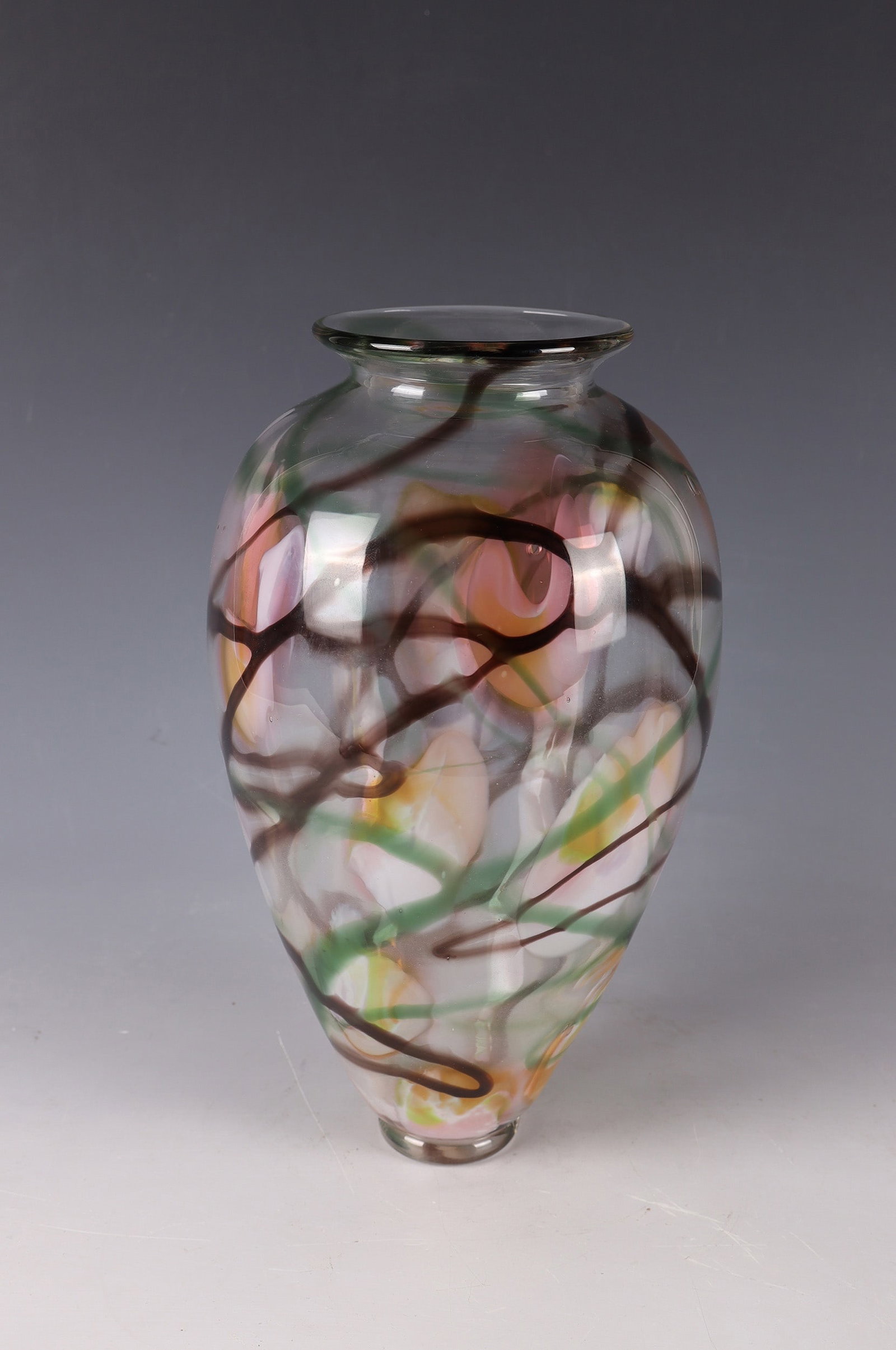 Vase ''Magnolia'': Vase ''Magnolia'' Adam Aaronson (design), Turnmill Studio, London, 1983 Colourless glass, inter-layer decoration of coloured enamels. Scheduled round stand. Underside multi-line engraved (partly