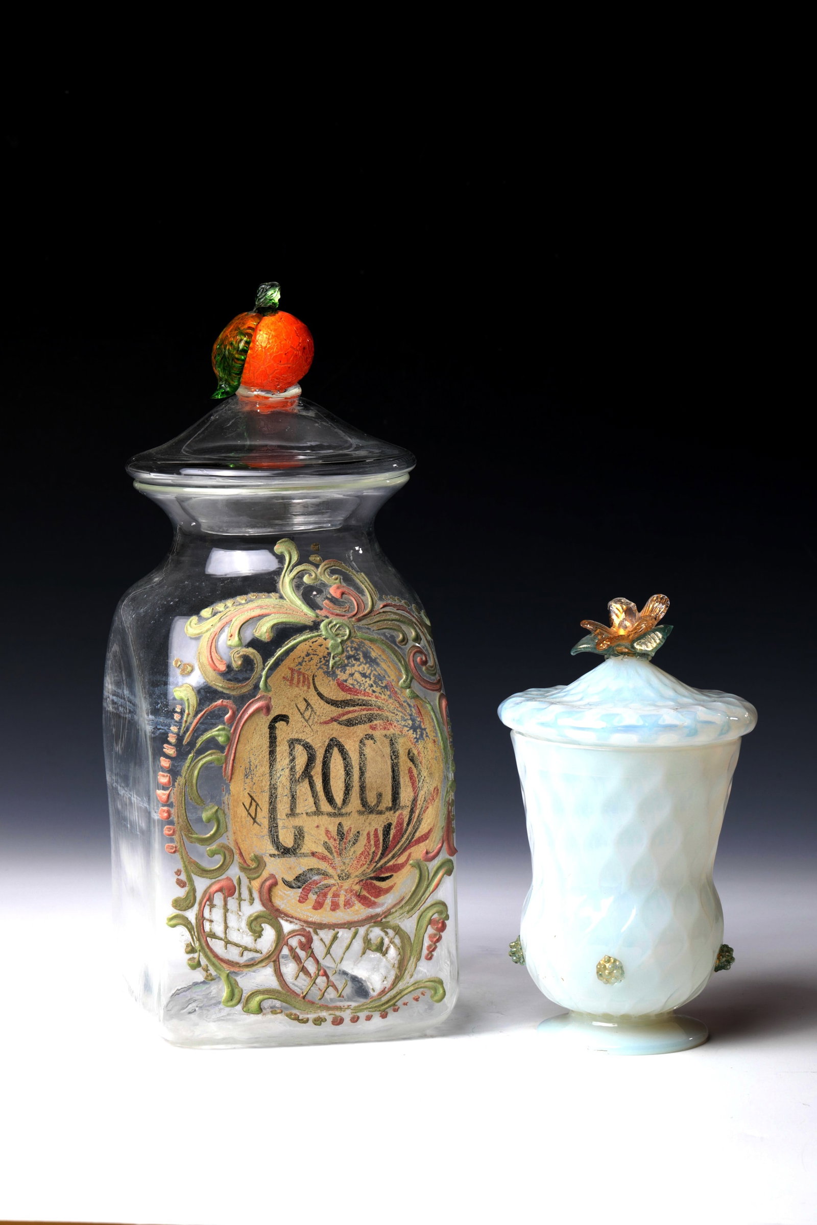 Apothecary Vessel and Foot Cup with Lid: Apothecary vessel and foot cup with lid 18th/19th century Colourless, slightly streaky glass. Raised floor with demolition. On the frontal on the cross-sectional square wall, polychrome, impasto