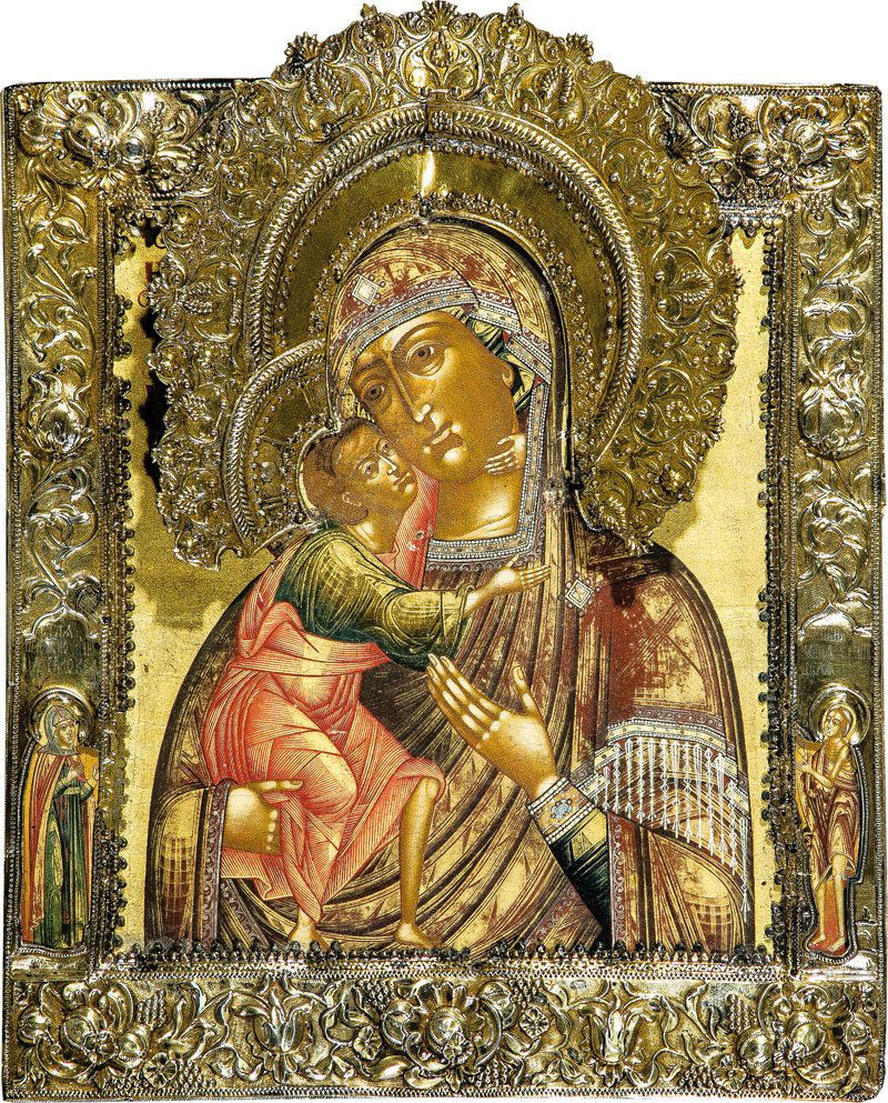 Gottesmutter von Wladimir (Wladimirskaja) mit: Gottesmutter von Wladimir (Wladimirskaja) mit Silberbasma Russland, um 1900 Laubholzeinzeltafel mit zwei Stirnseitensponki. Lewkas, Eitempera, Goldfond. Halbfigurige, frontale Darstellung der Gottesmu