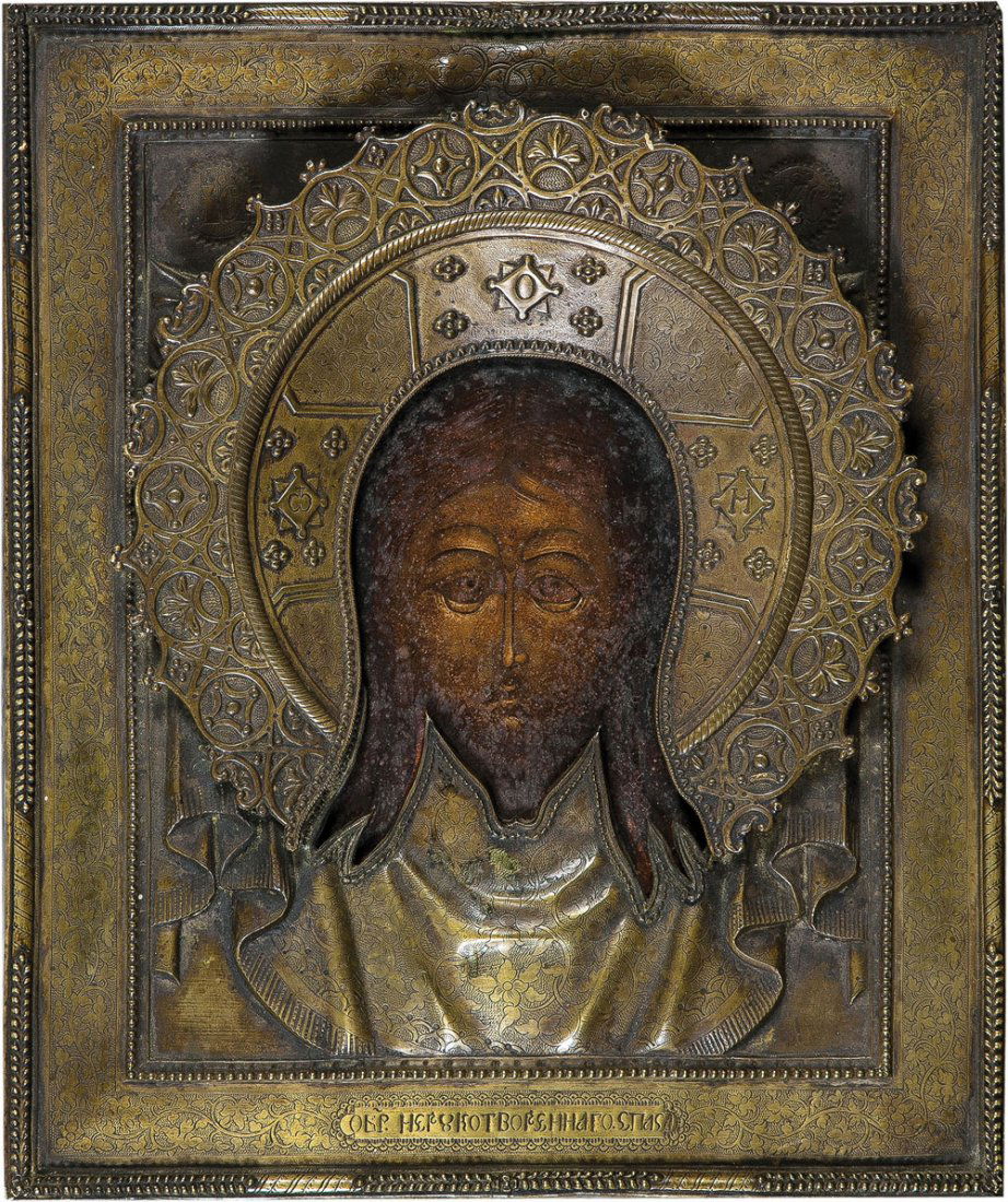 Mandylion mit Oklad: Mandylion mit Oklad Russland, 19. Jh. Laubholz-Einzeltafel mit zwei Rückseiten-Sponki (verloren). Tempera auf Kreidegrund. Im Mittelfeld Darstellung des nicht von Menschenhand geschaffenen Antlitz Ch