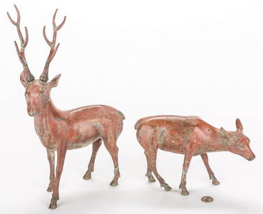 Pair Chinese Bronze Deer, exhibited: Pair of Chinese Archaic style bronze deer, the buck standing, the doe grazing. Buck has removable antlers. Buck - 15 1/2" H x 10" W x 10" D. Early 20th century. Exhibited at the Dixon Museum,