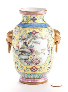 Chinese Yellow Ground Enamel Decorated Porcelain Vase: Chinese enameled porcelain Famille Rose vase having a yellow sgraffiato ground with a painted landscape reserve to one side and Chinese characters within reserve to the other. Additional polychrome